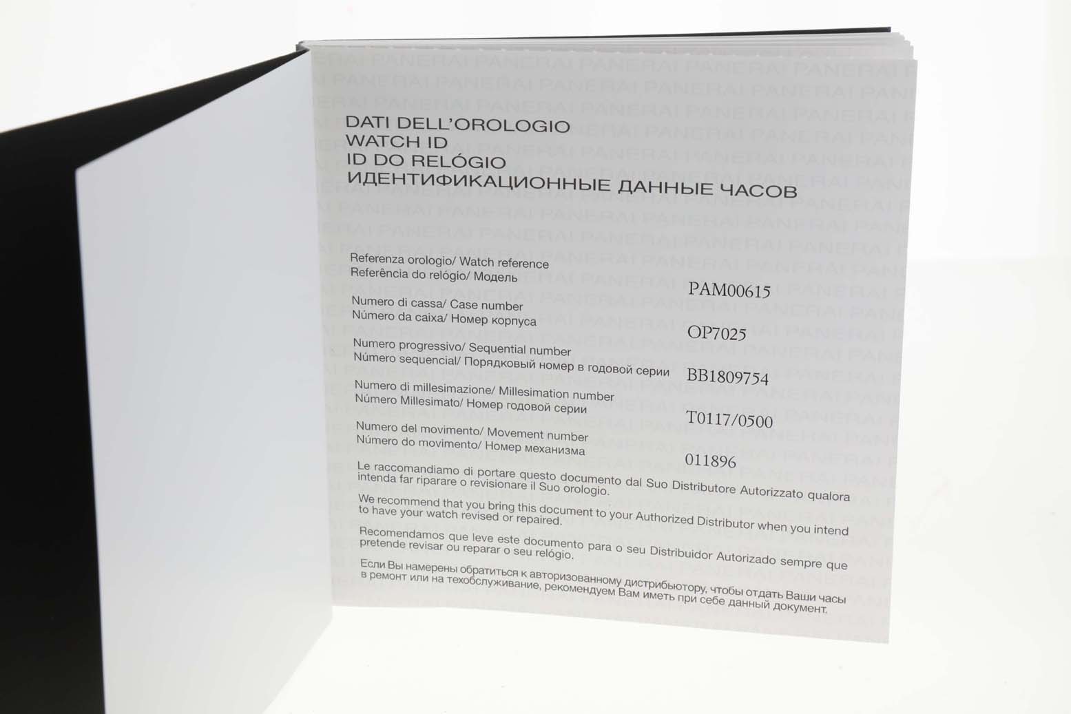 The image shows an open booklet with watch identification information for the Panerai Submersible PAM00615 Men's Titanium Black Dial PAM00615 Men's Titanium Black Dial model PAM00615.