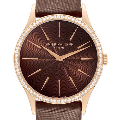 The Patek Philippe Calatrava 4897R-001 Womens Rose Gold Brown Dial watch is shown face-on, highlighting its brown textured dial, diamond bezel, and brown strap.