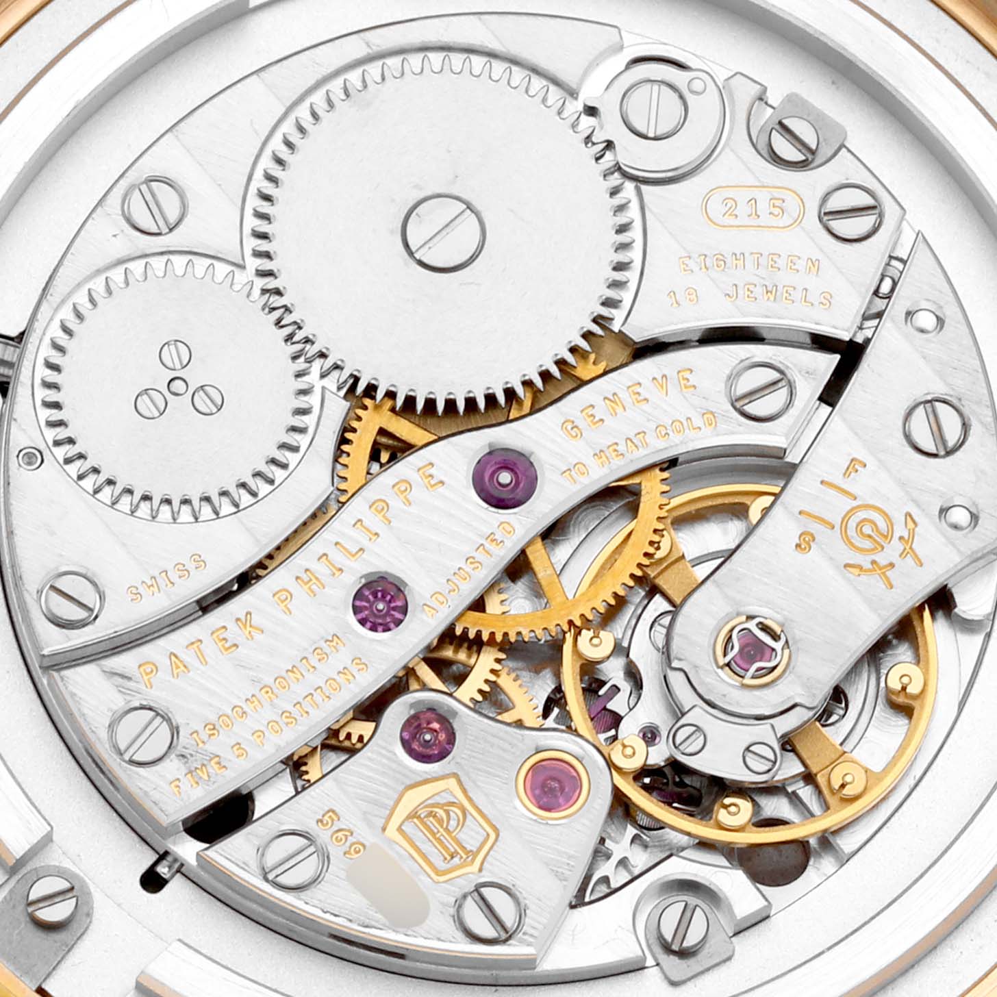 The image shows a close-up of the Patek Philippe Calatrava 4897R-001 Womens Rose Gold Brown Dials movement, highlighting gears and jewels.