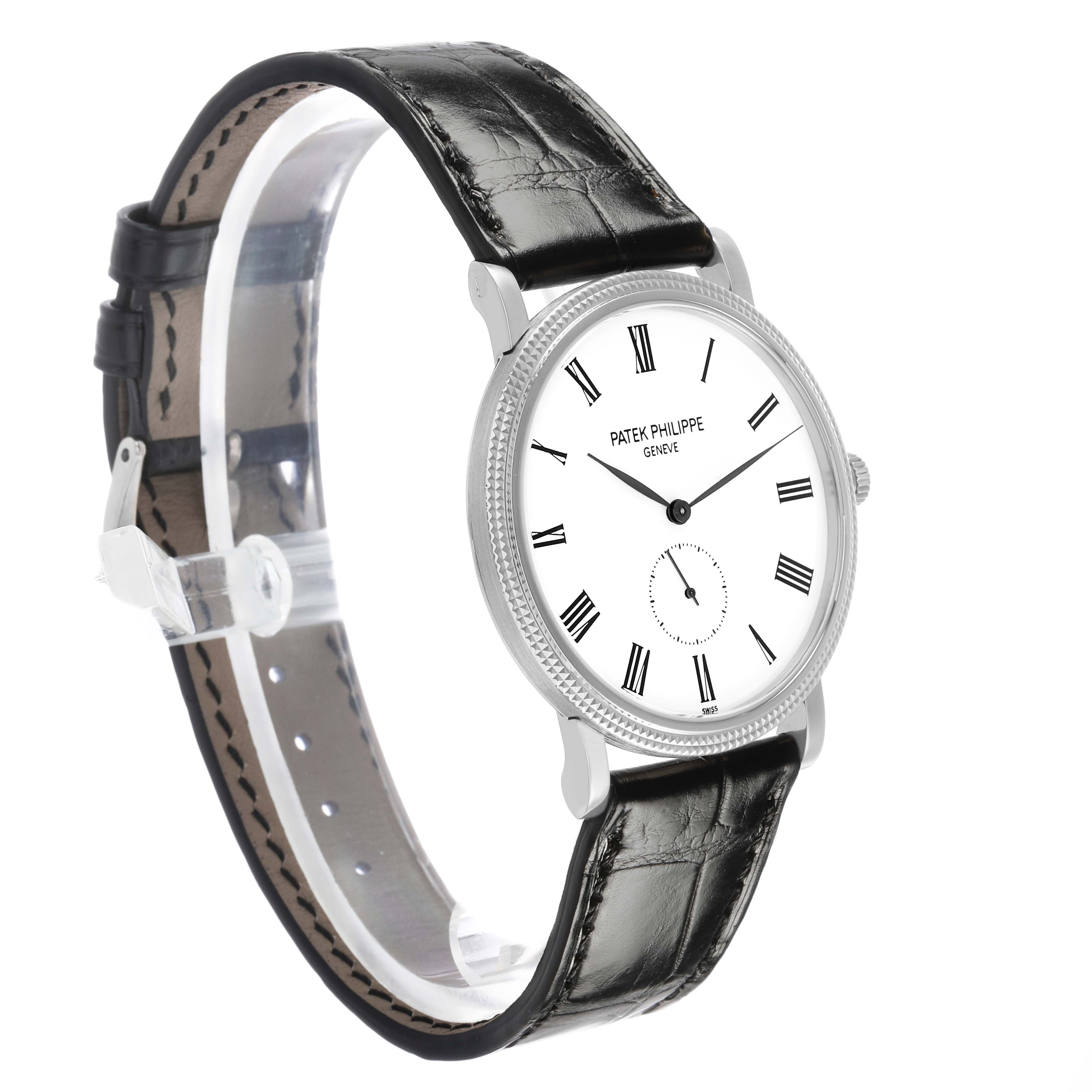 The Patek Philippe Calatrava 5119G-001 Men's White Gold White Dial watch is displayed at a slight side angle, showing the face, bezel, crown, and leather strap.