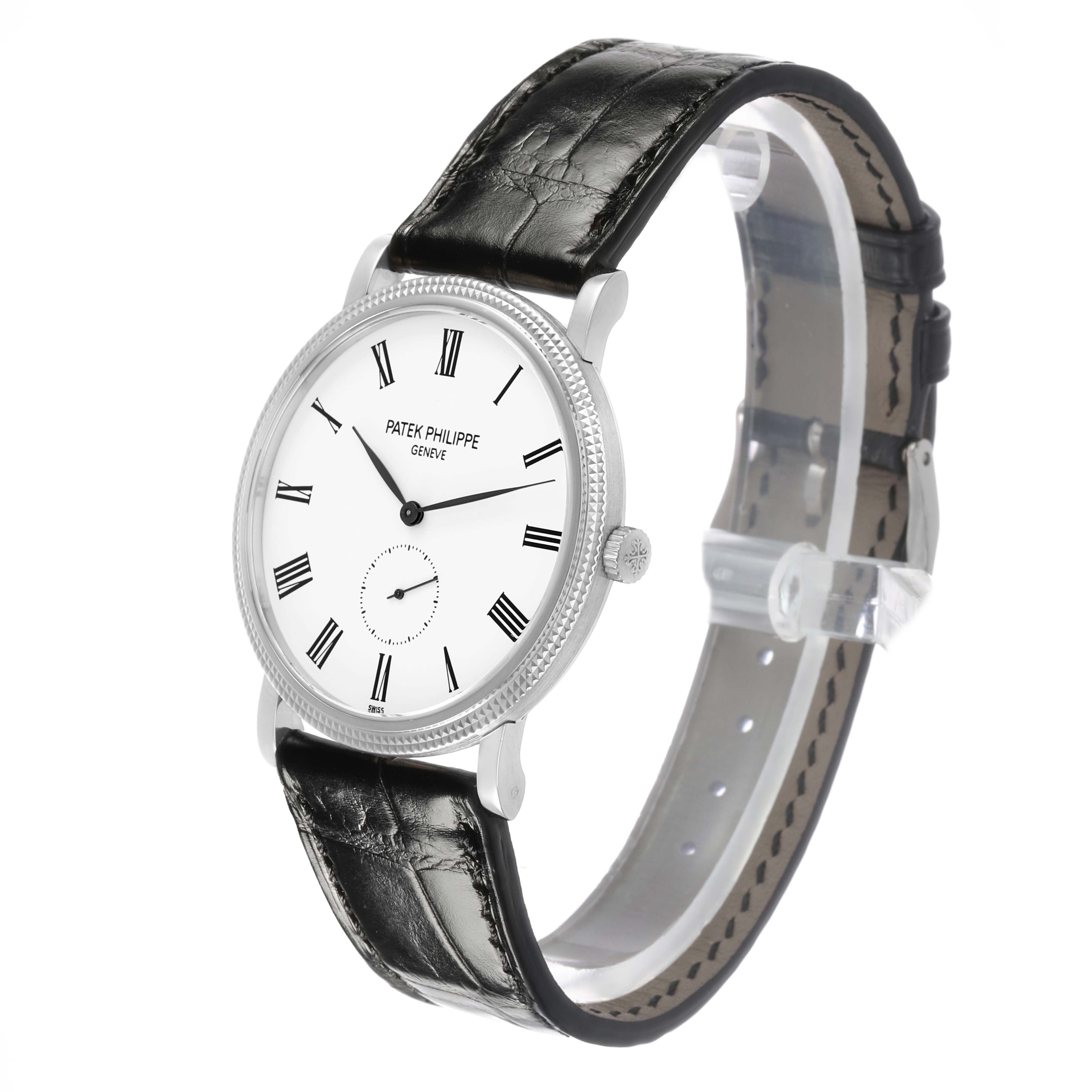 The Patek Philippe Calatrava 5119G-001 Men's White Gold White Dial watch is shown at a slight angle, highlighting the dial, case side, crown, and leather strap.
