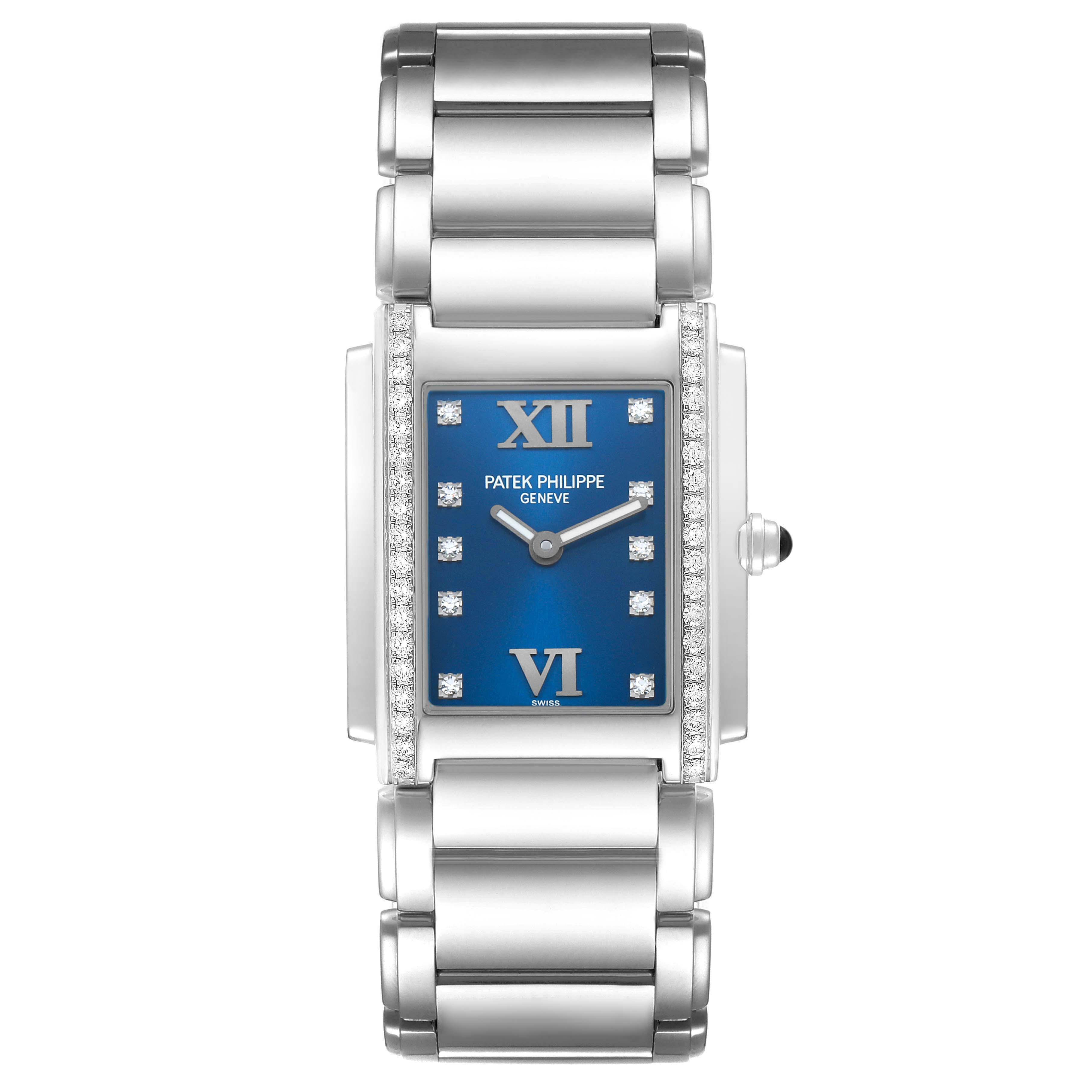 The Patek Philippe Twenty-4 4910A Women's Stainless Steel Blue Dial watch is shown from a top-down angle, highlighting its blue dial, diamond bezel, and metallic bracelet.