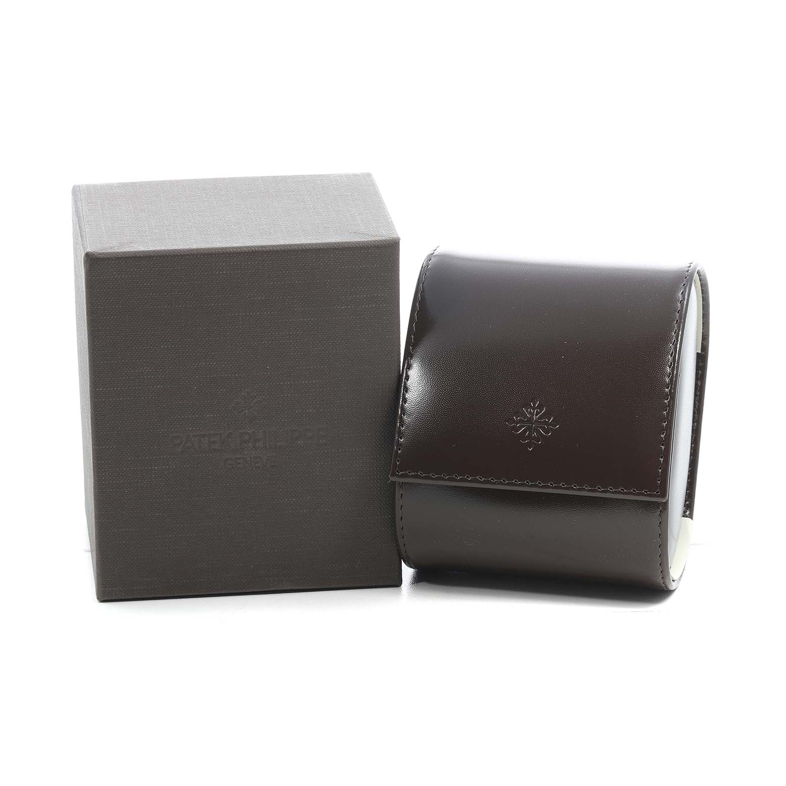 The image shows a Patek Philippe Twenty-4 4910A Women's Stainless Steel Blue Dial model watch box and leather pouch, both viewed from the front angle.