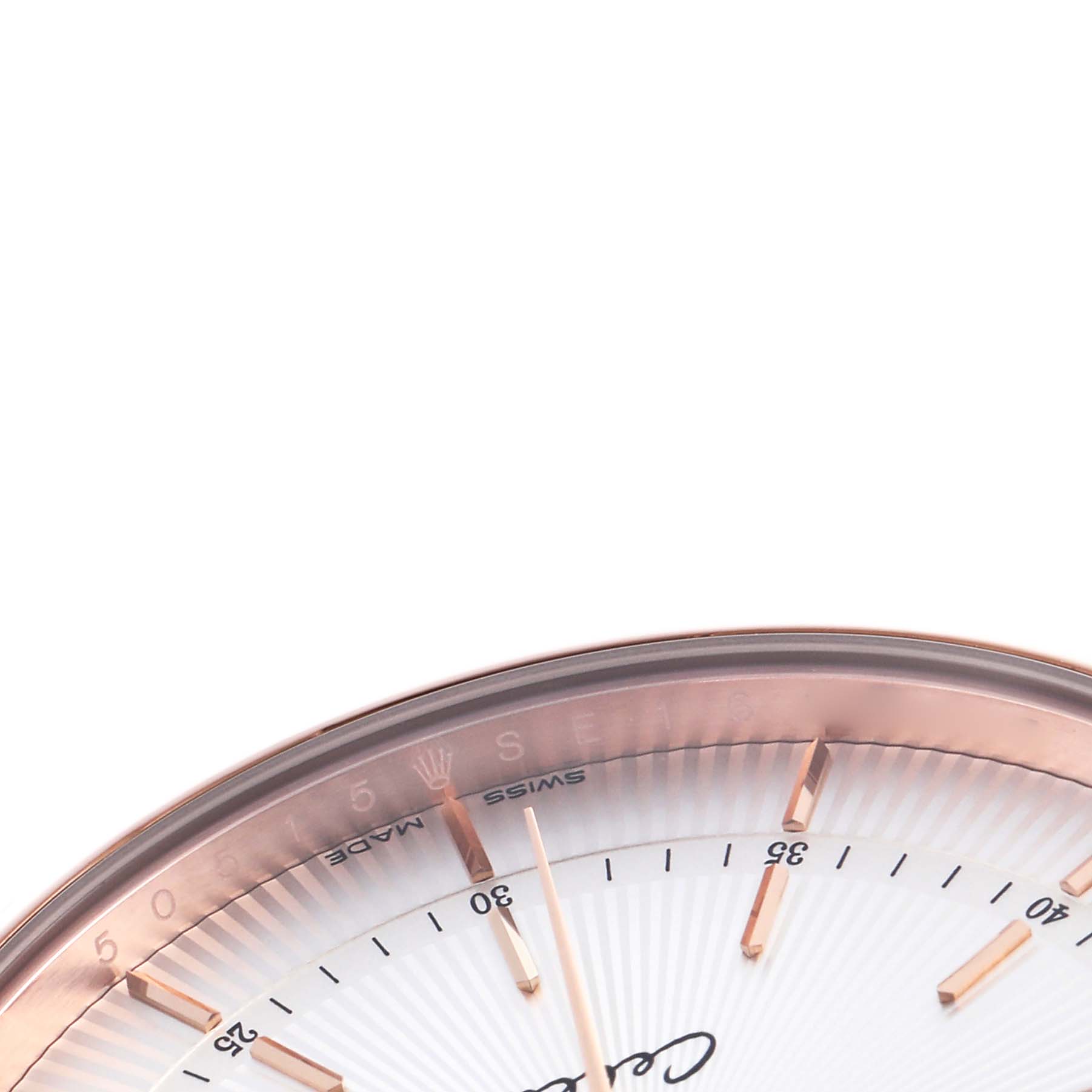 The image shows the upper portion of a Rolex Cellini 50515 Men
s Rose Gold Silver Dial 50515 Men
s Rose Gold Silver Dial watch, highlighting the bezel, markers, and part of the dial.