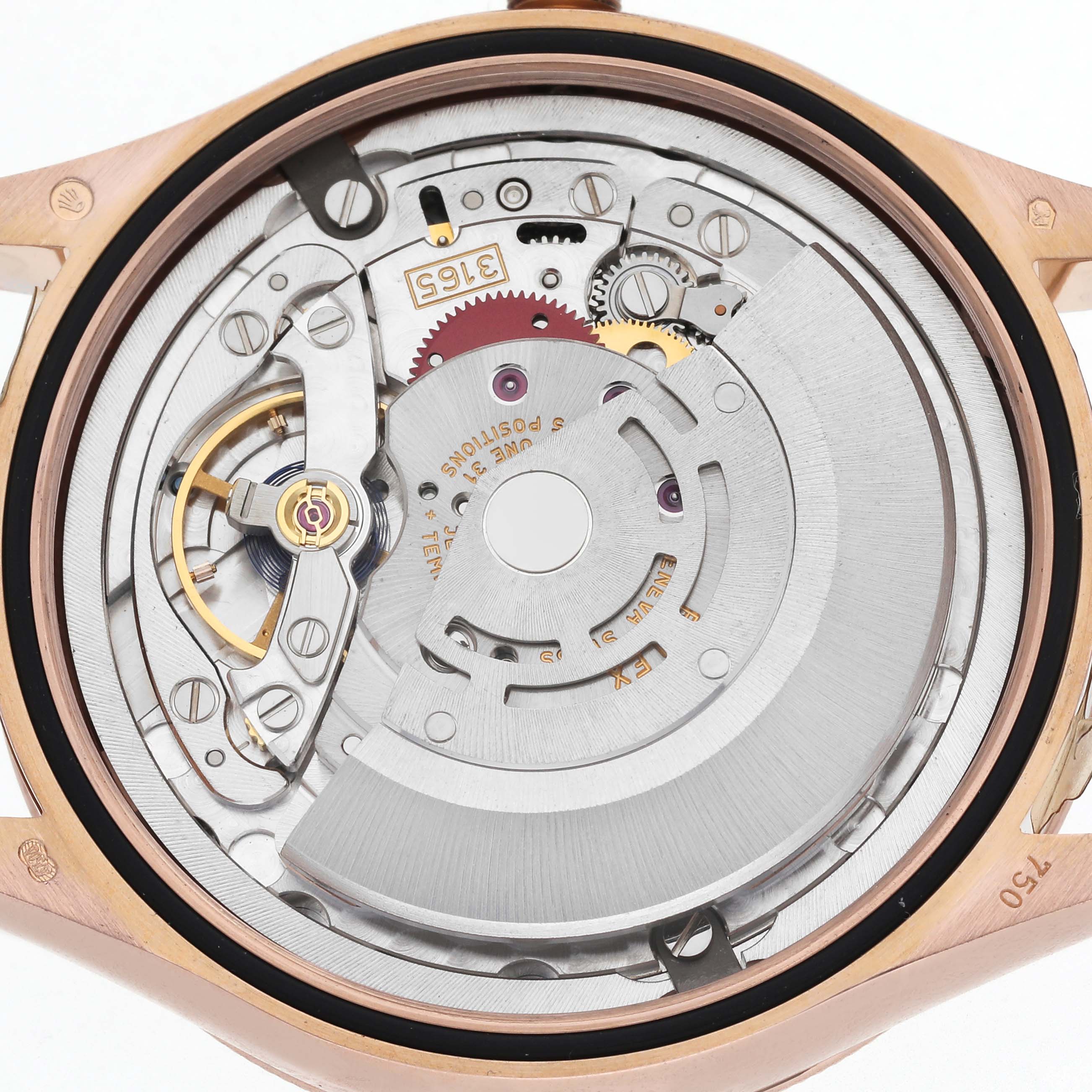 The image shows the movement of a Rolex Cellini 50515 Men
s Rose Gold Silver Dial 50515 Men
s Rose Gold Silver Dial watch from a rear angle, displaying the intricate mechanical components.