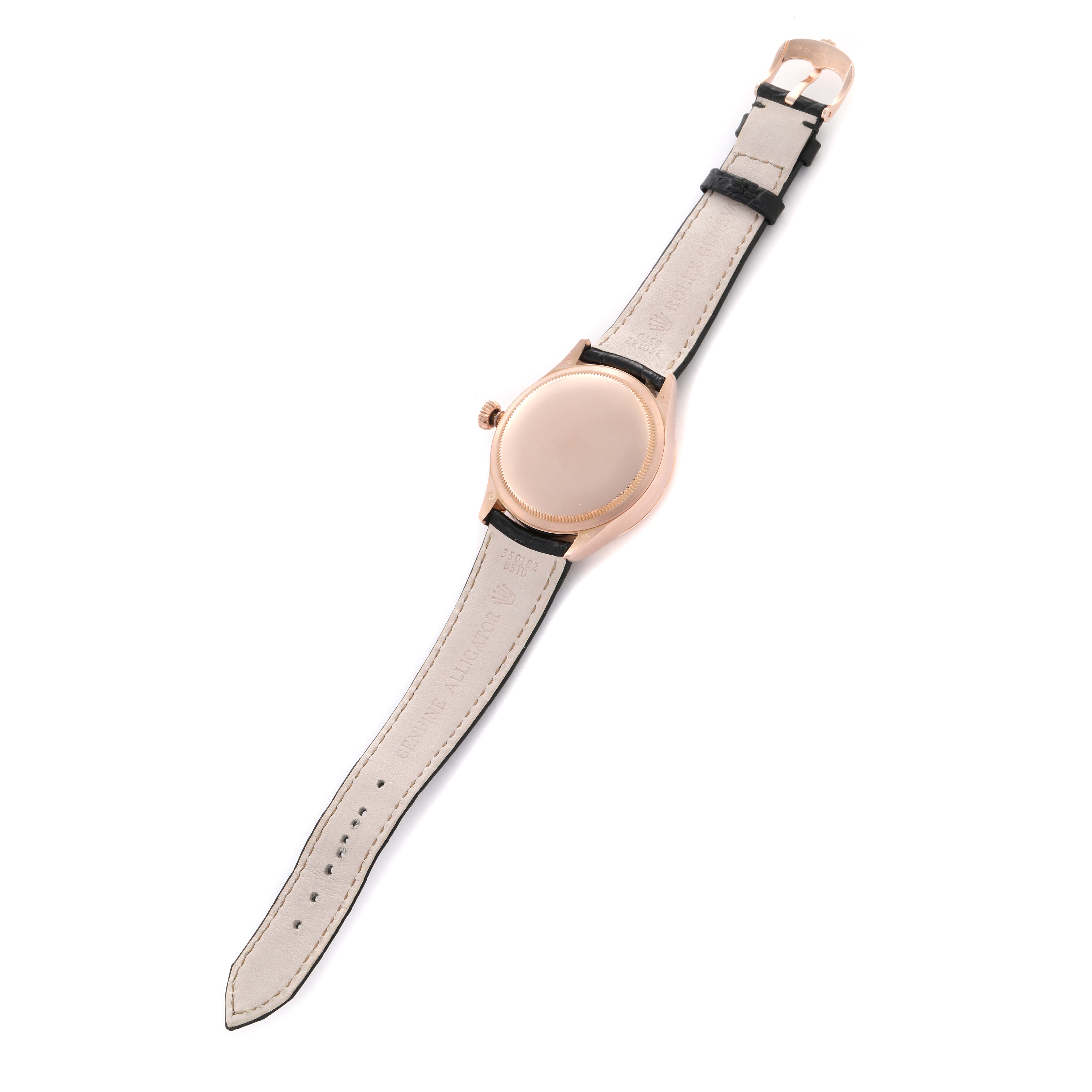 The image shows the back and strap of a Rolex Cellini 50515 Men
s Rose Gold Silver Dial 50515 Men
s Rose Gold Silver Dial watch, displaying the underside and clasp area.