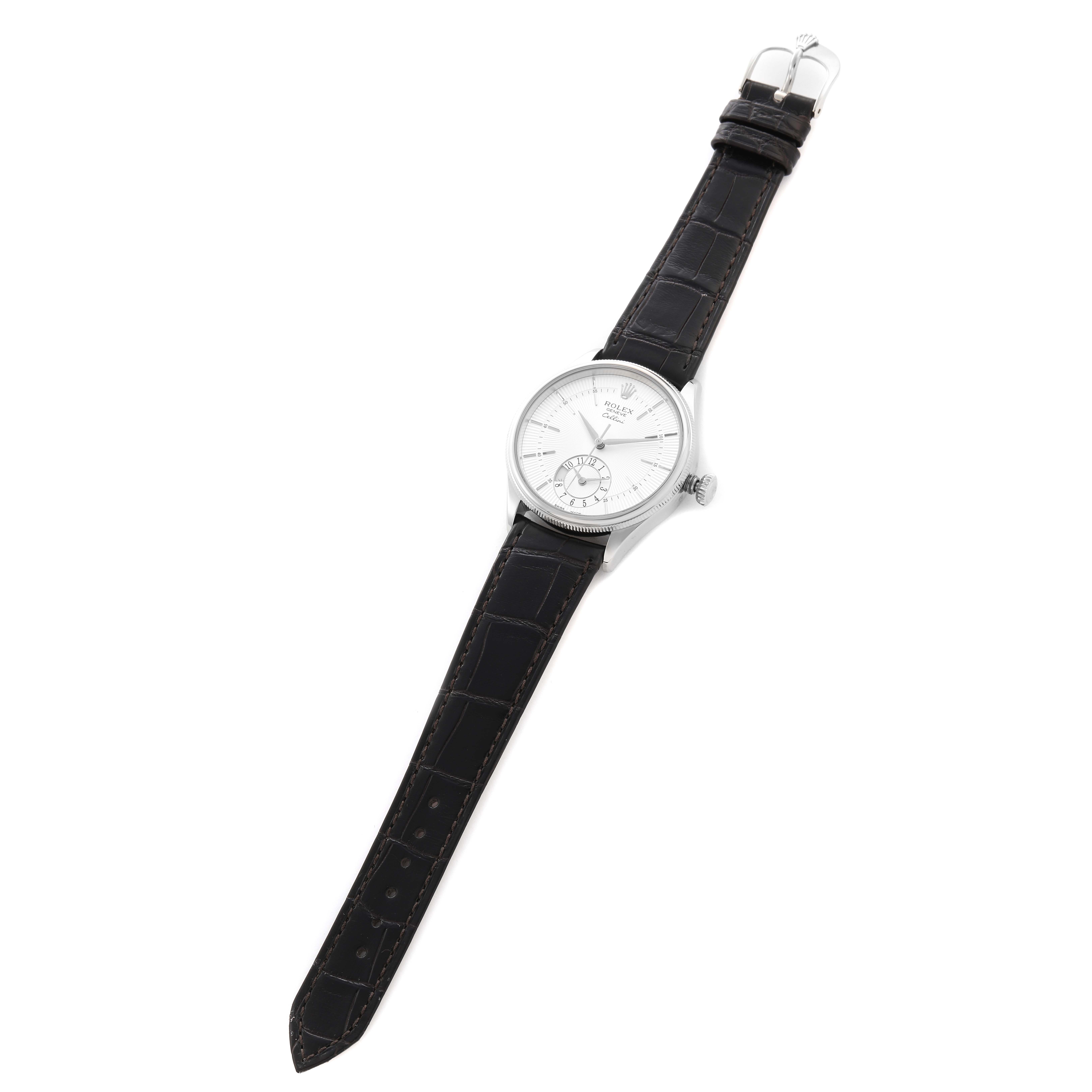 The Rolex Cellini 50529 Men
s White Gold Silver Dial 50529 Men
s White Gold Silver Dial watch is shown from a top-down angle, displaying the dial, case, strap, and buckle.