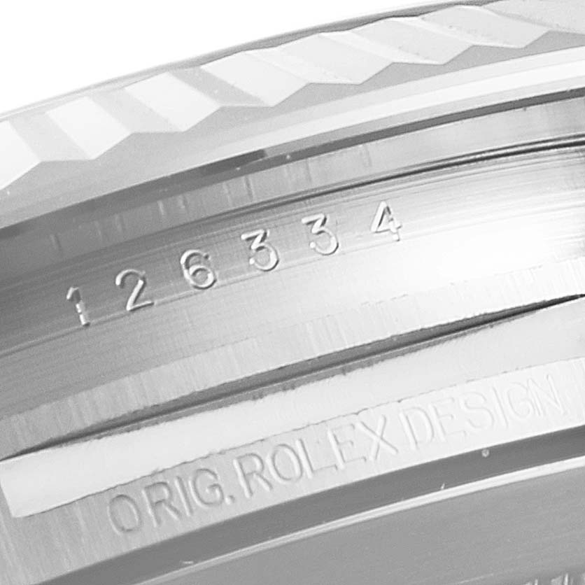 The image shows a close-up of the engraved model number and "Orig. Rolex Design" on the Rolex Datejust 41 126334 Men's Stainless Steel Black Dial 126334 Men's Stainless Steel Black Dial bezel.