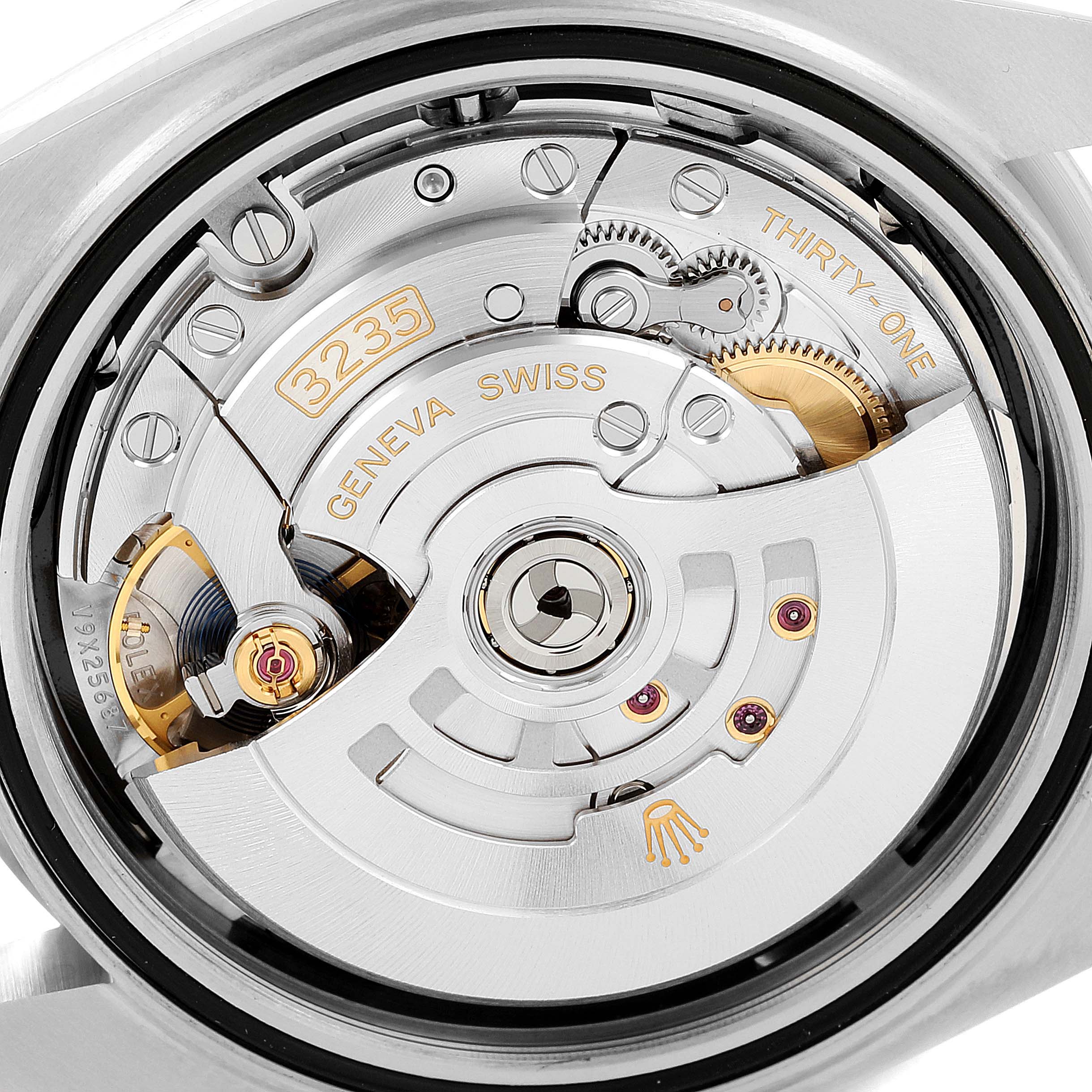 This close-up image shows the intricate movement mechanism of the Rolex Datejust 41 126334 Men's Stainless Steel Black Dial 126334 Men's Stainless Steel Black Dial watch.