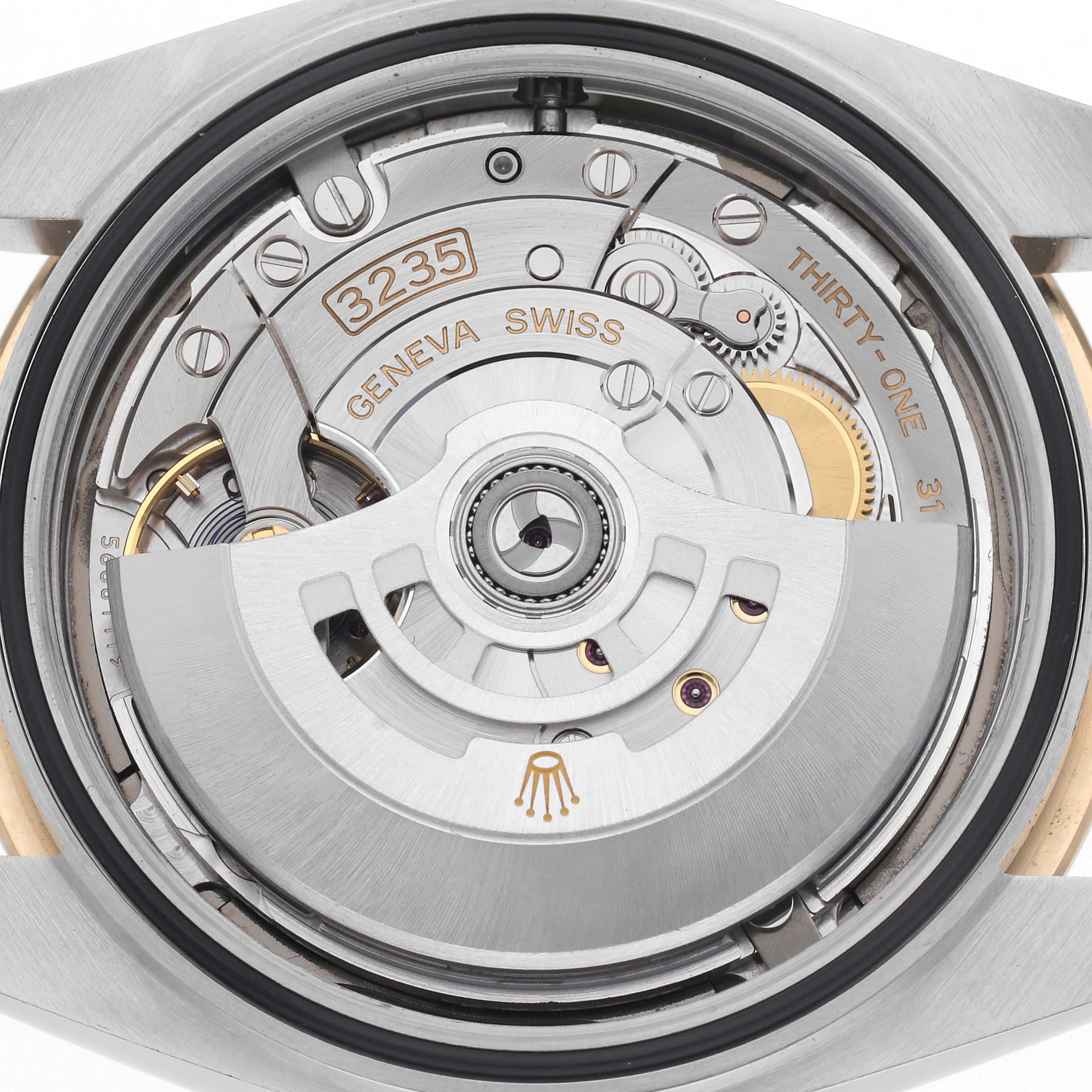 The image shows a close-up of the movement of a Rolex Datejust 41 126333 Men
s Steel and Gold (two tone) Grey Dial 126333 Men
s Steel and Gold (two tone) Grey Dial, focusing on the mechanism
s intricate details.