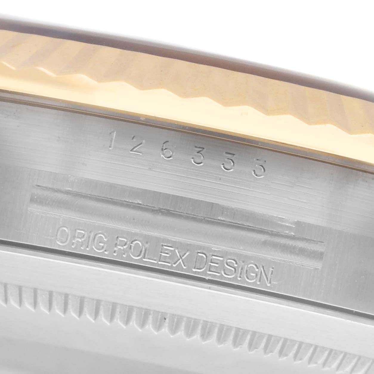 The image shows the side of a Rolex Datejust 41 126333 Men
s Steel and Gold (two tone) Grey Dial 126333 Men
s Steel and Gold (two tone) Grey Dial, highlighting its engraved model number and "Orig. Rolex Design" text.