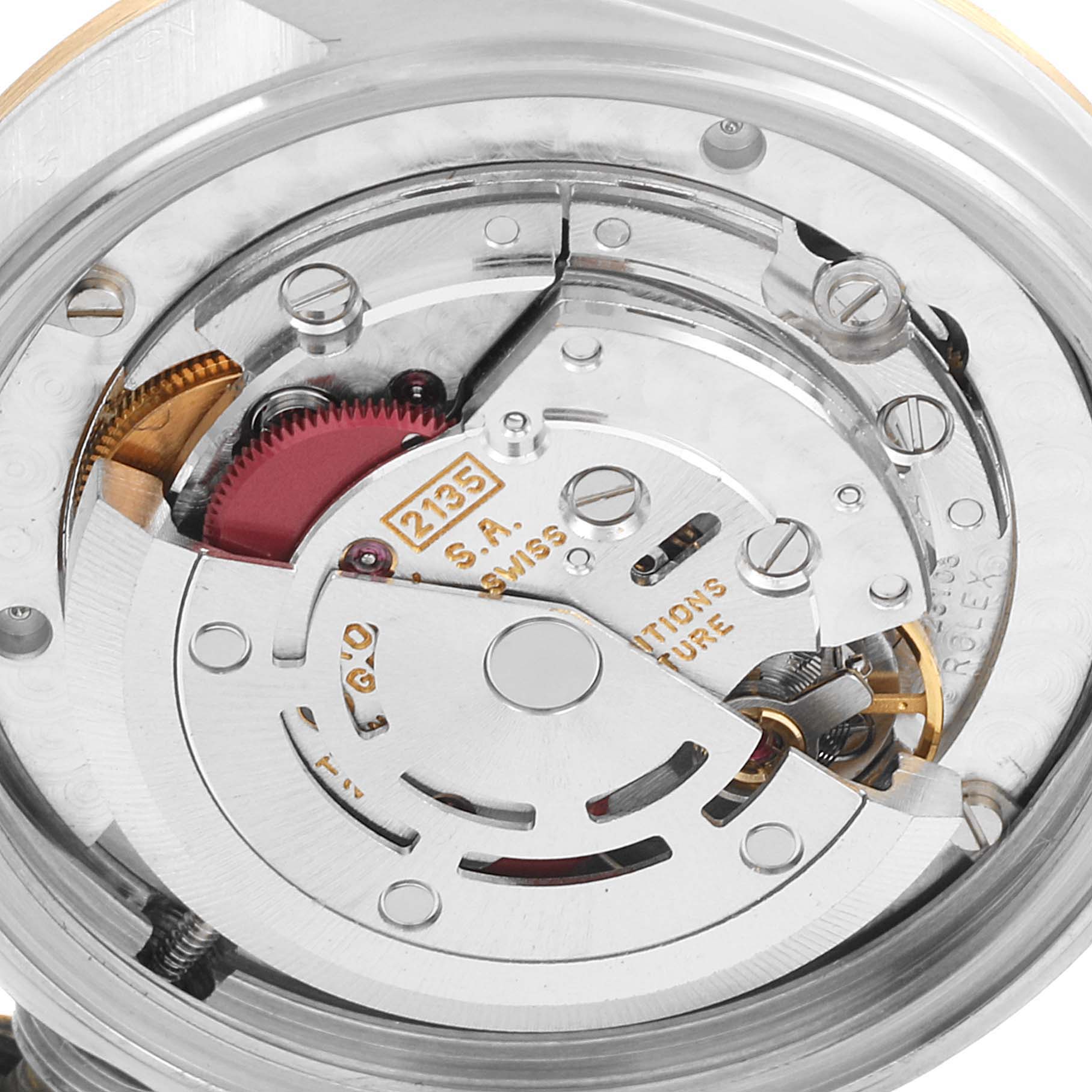 This close-up shows the inner mechanical movement parts of a Mid-Size Rolex watch with precision details.