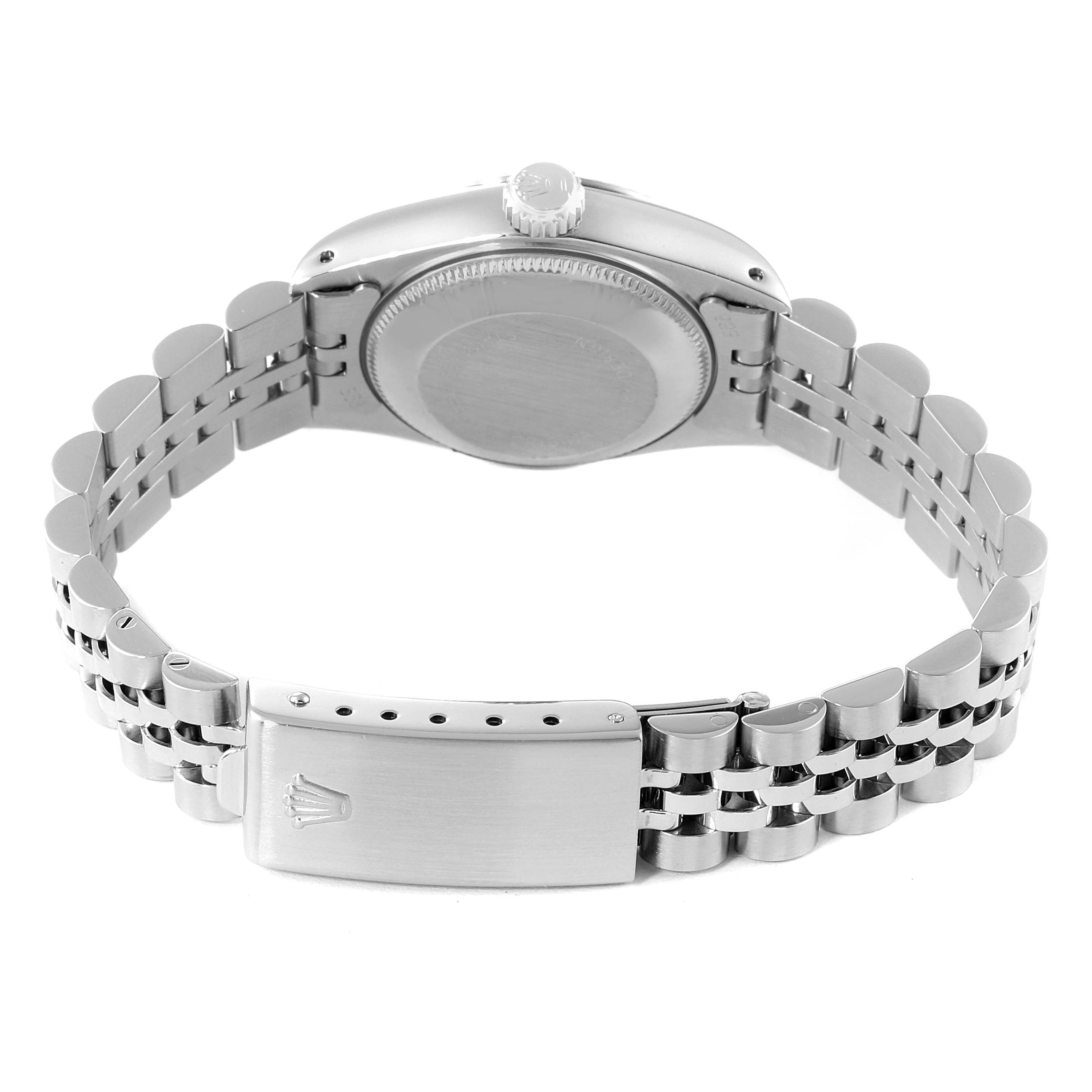 This image shows the back case, crown, and bracelet with clasp of a Rolex Datejust 69174 Women
s Stainless Steel Silver Dial 69174 Women
s Stainless Steel Silver Dial watch, viewed from the rear.