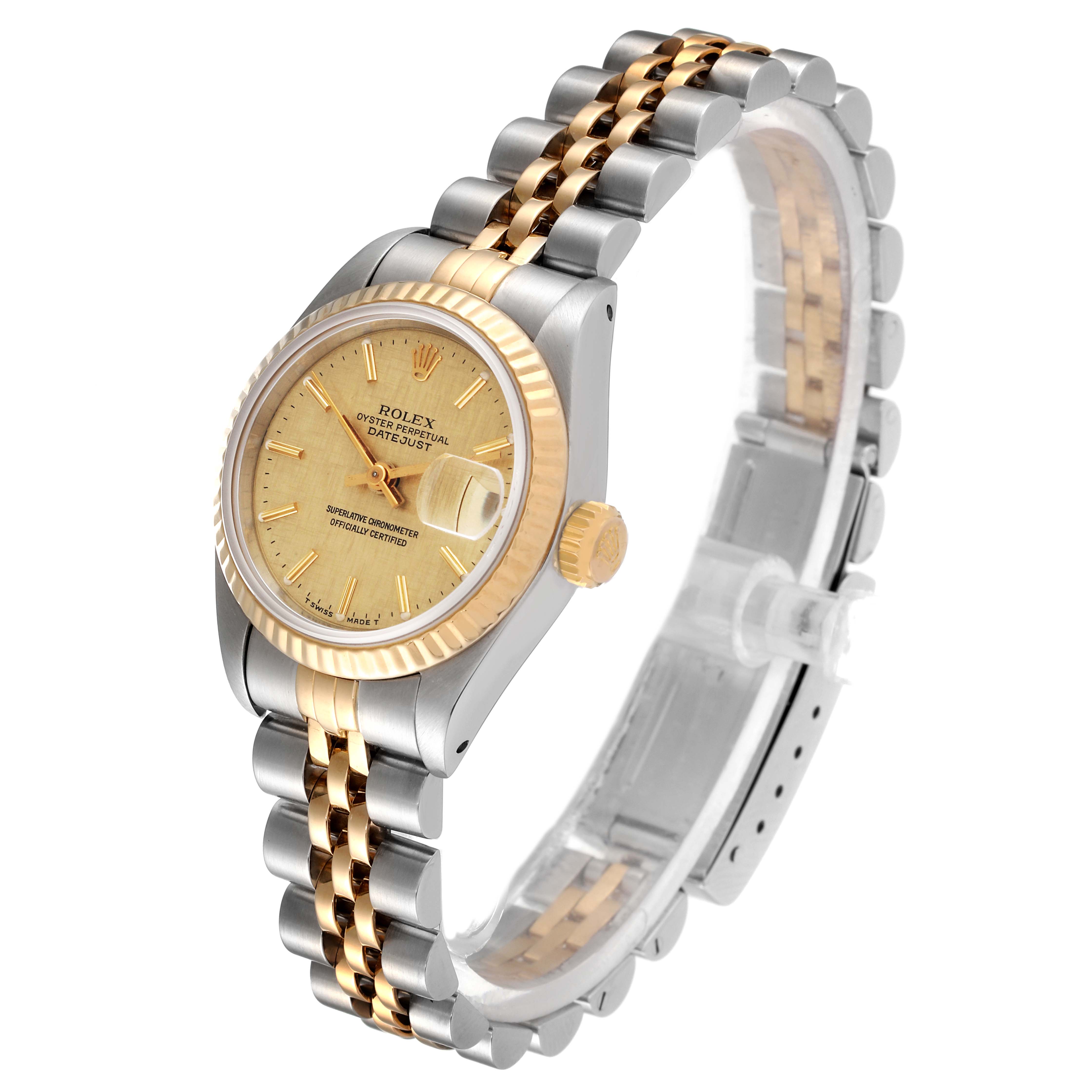 The Rolex Datejust 69173 Women
s Steel and Gold (two tone) Champagne Dial 69173 Women
s Steel and Gold (two tone) Champagne Dial watch is shown at a three-quarter angle, displaying the face, bezel, crown, and part of the bracelet.