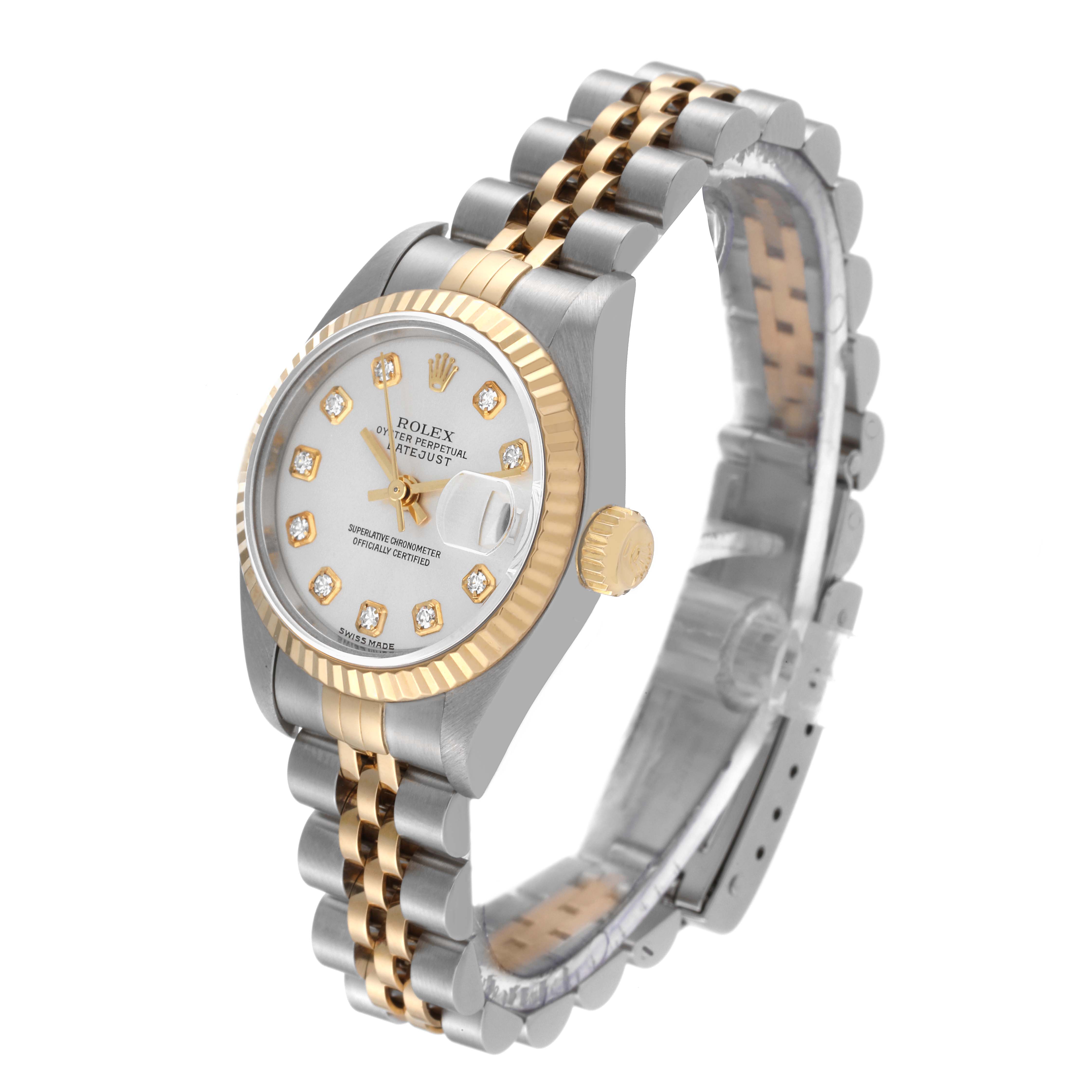 This image shows a Rolex Datejust 79173 Women's Steel and Gold (two tone) Silver Dial 79173 Women's Steel and Gold (two tone) Silver Dial watch at a slight angle, highlighting its dial, bezel, crown, and part of the bracelet.