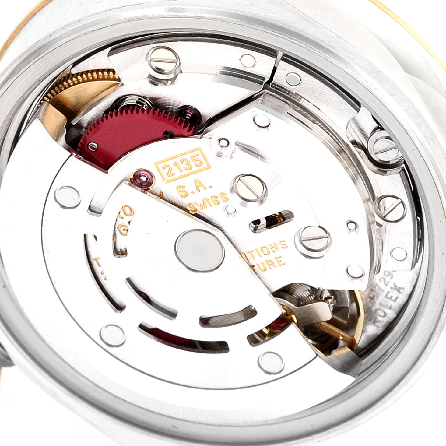 This image shows a close-up of the movement mechanism of a Rolex Datejust 69173 Women's Steel and Gold (two tone) White Dial 69173 Women's Steel and Gold (two tone) White Dial watch from a rear angle, highlighting the intricate internal components.