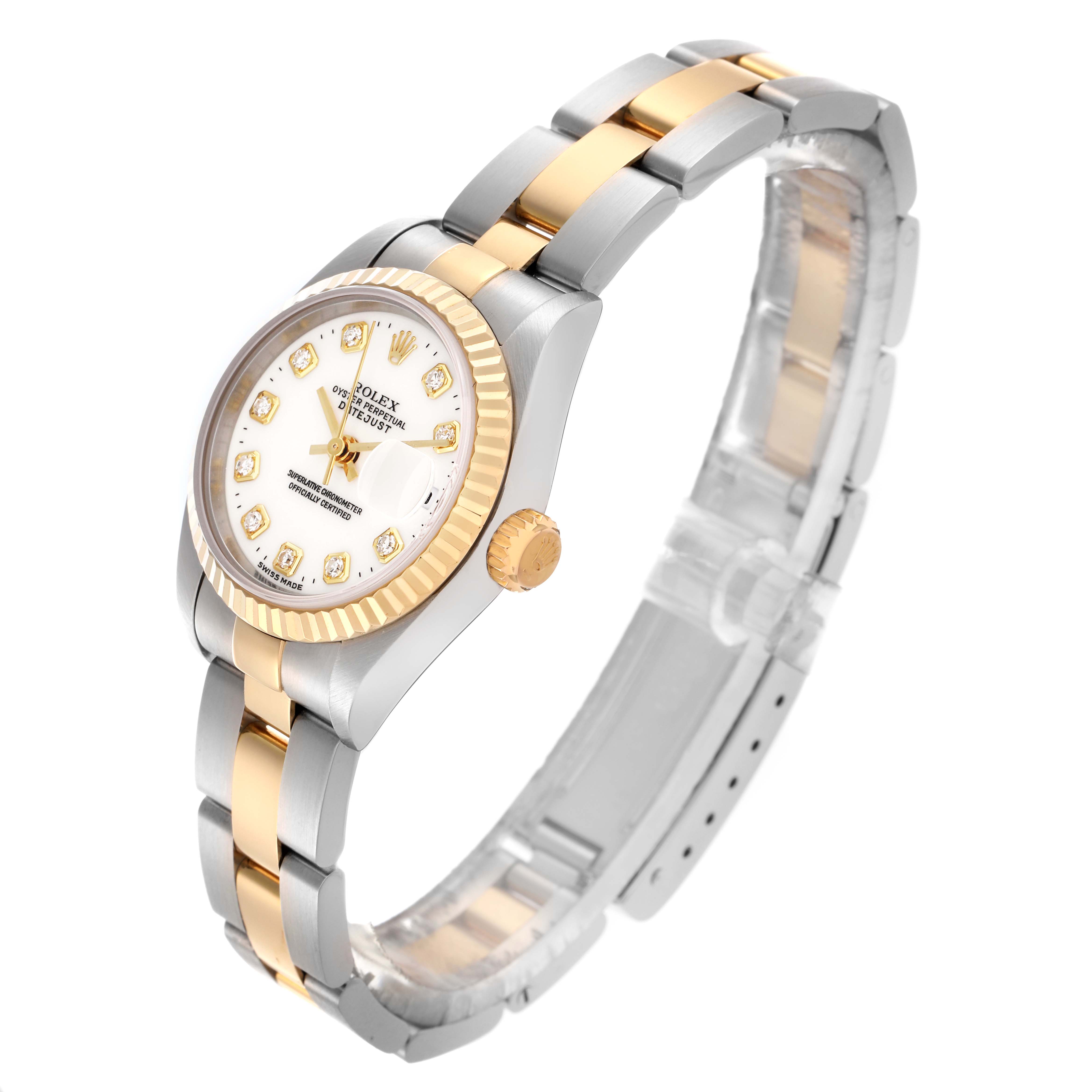 The Rolex Datejust 79173 Women's Steel and Gold (two tone) White Dial 79173 Women's Steel and Gold (two tone) White Dial watch is shown from an angled side view, highlighting the dial, bezel, crown, and two-tone bracelet.