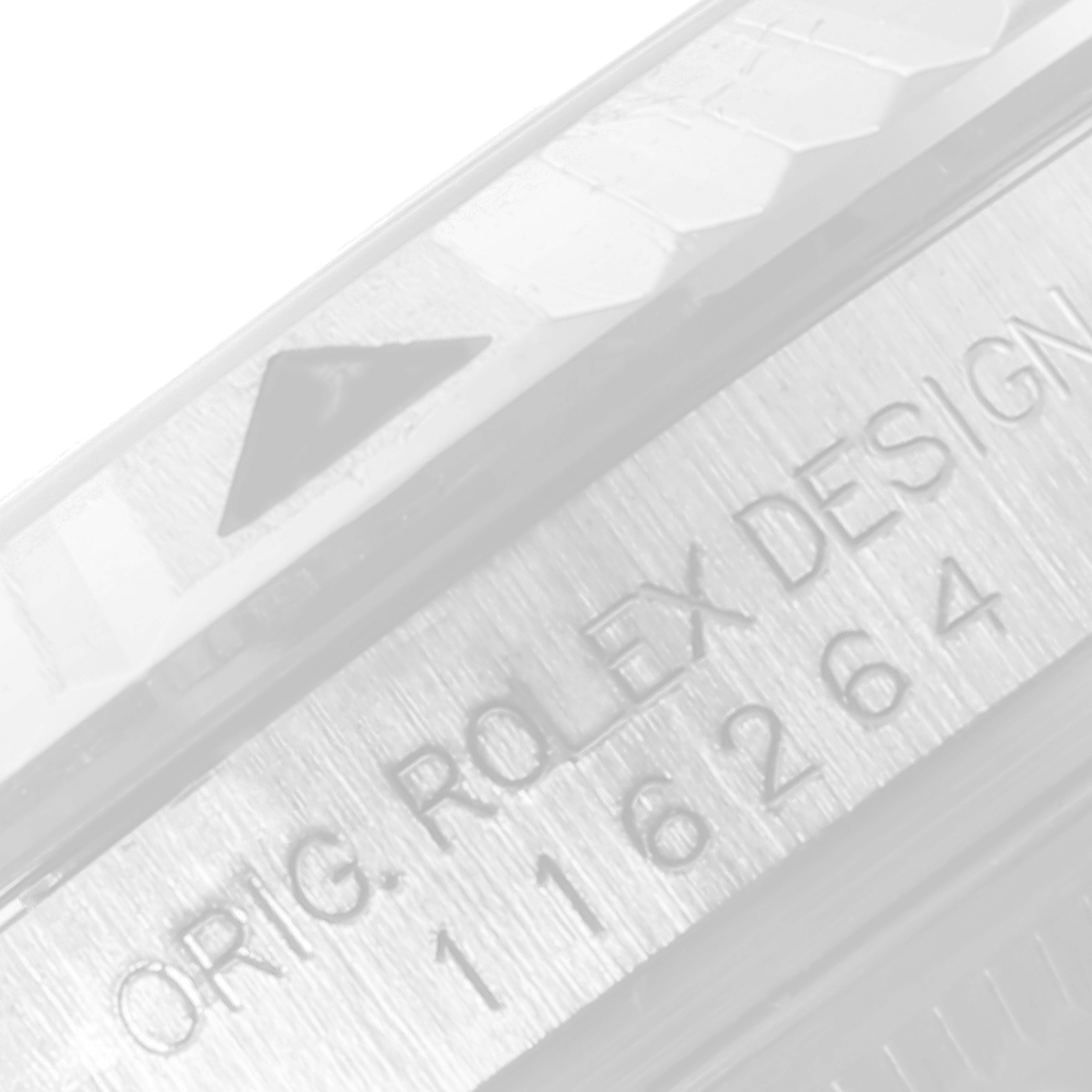 The image shows a close-up angle of the bezel and case side of the Rolex Turn-o-Graph 116264 Men
s Stainless Steel Black Dial 116264 Men
s Stainless Steel Black Dial, highlighting the serial number and "ORIG. ROLEX DESIGN" engraving.