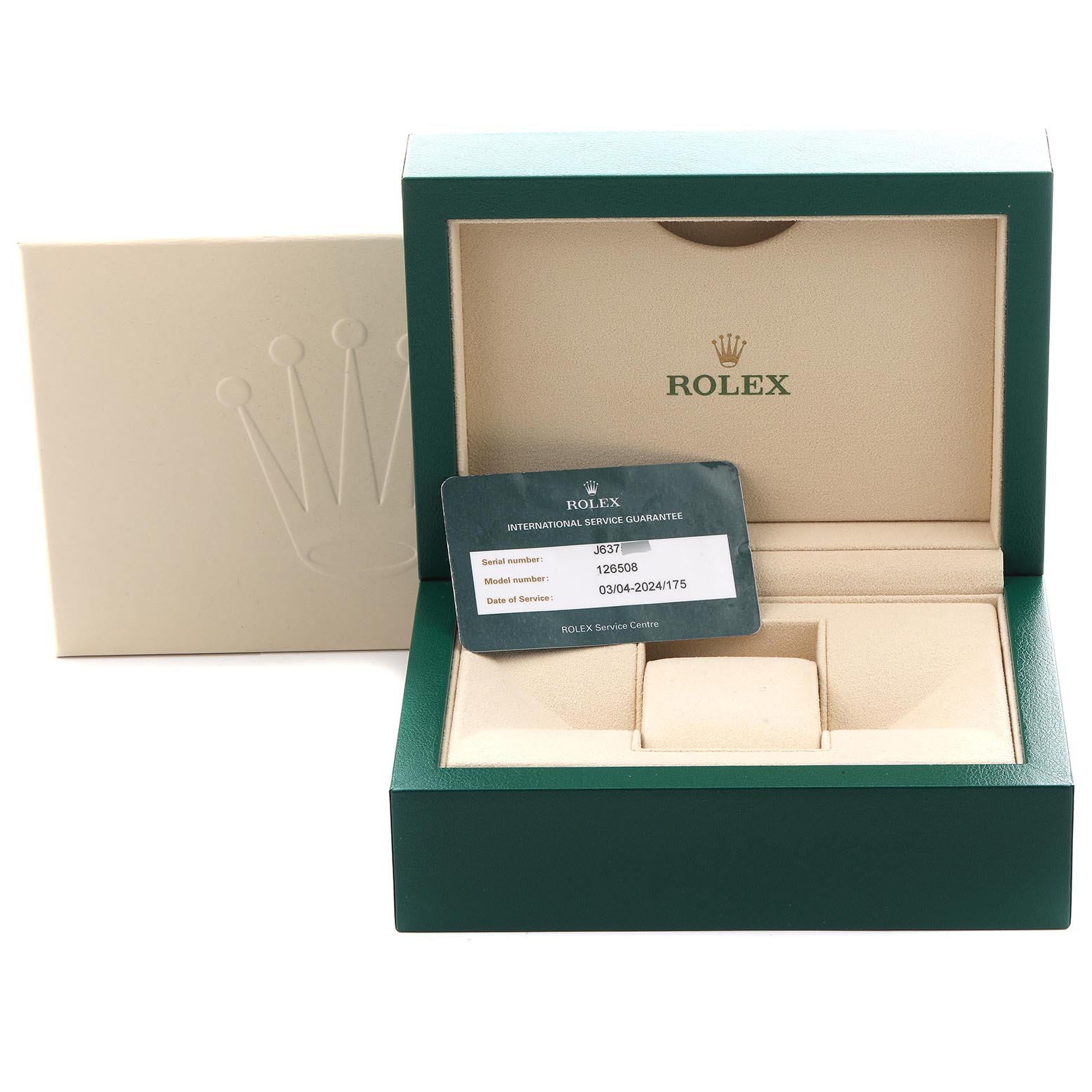 The image shows a Rolex Daytona 126508 Men
s Yellow Gold Black Dial 126508 Men
s Yellow Gold Black Dial watch box and guarantee card, viewed from the front with the lid open.