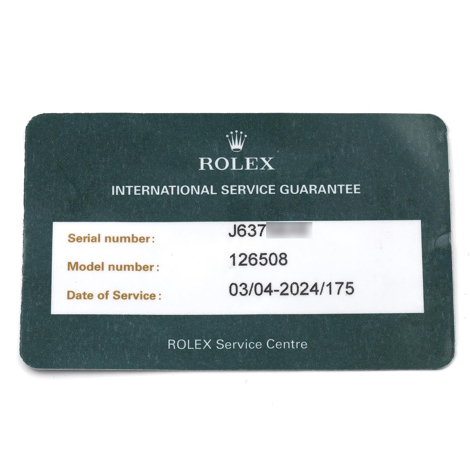 The image shows a Rolex International Service Guarantee card for a Daytona model, displaying serial, model number, and service date.