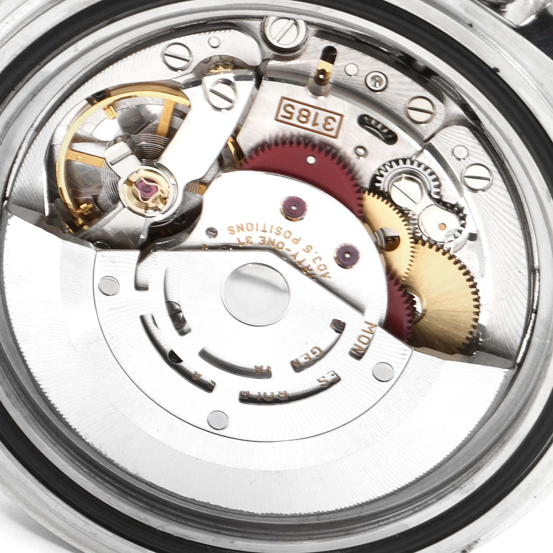 The image shows the intricate inner mechanism of a Rolex Explorer 16570 Men's Stainless Steel White Dial 16570 Men's Stainless Steel White Dial watch, displaying its gears and movement components.