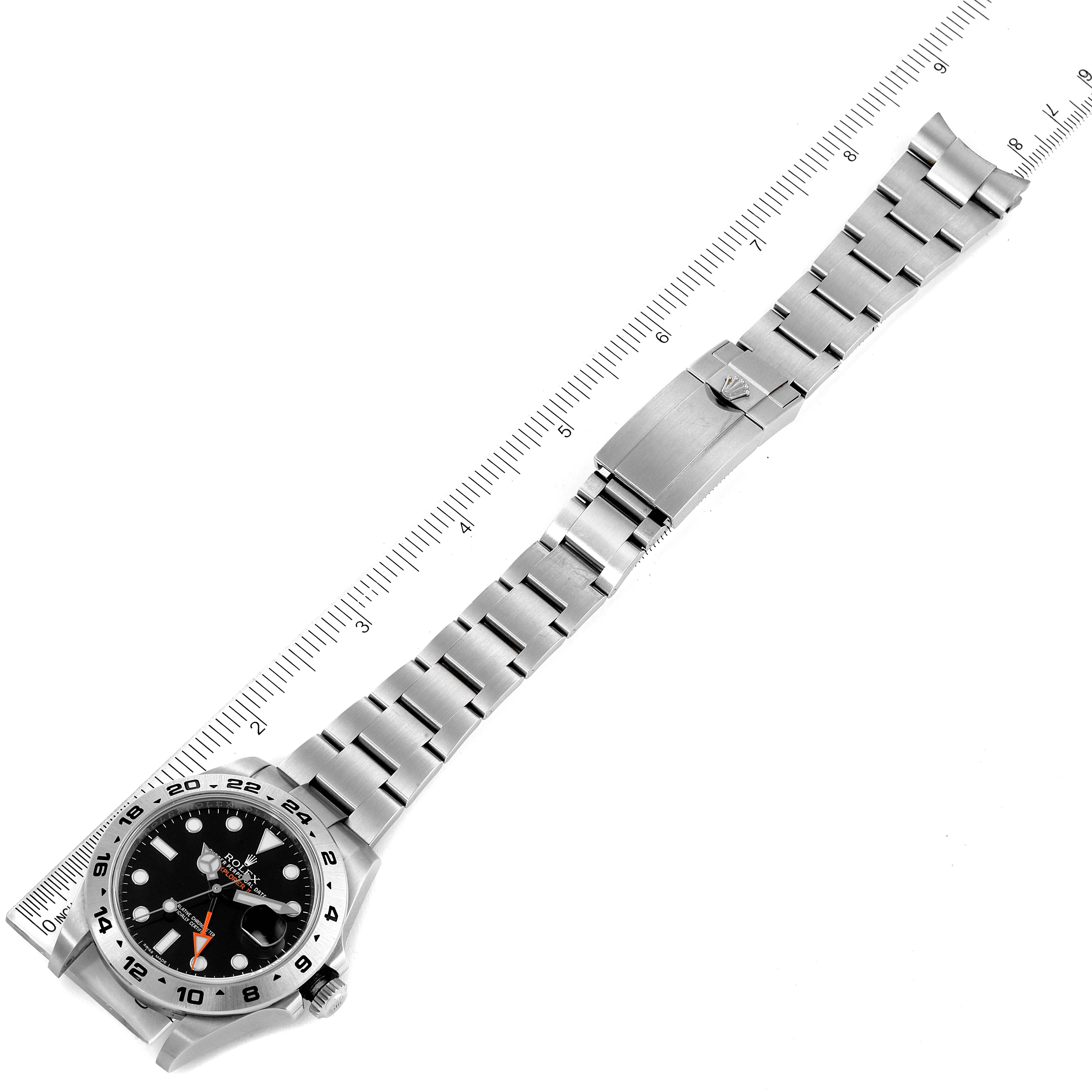 The image shows the front of a Rolex Explorer 216570 Men
s Stainless Steel Black Dial 216570 Men
s Stainless Steel Black Dial watch laid flat, displaying its face, bezel, bracelet, and clasp.