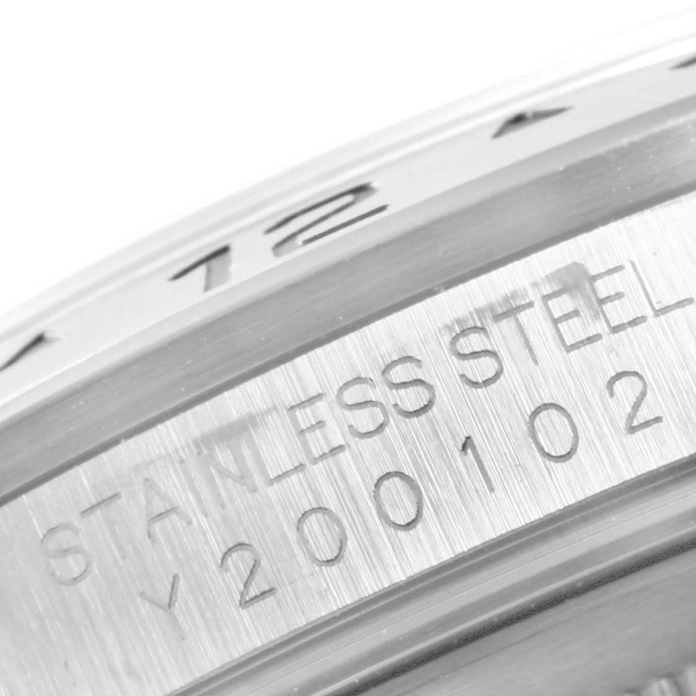 This close-up image shows the stainless steel bezel and engraving details of the Rolex Explorer 16570  Men
s Stainless Steel Black Dial 16570  Men
s Stainless Steel Black Dial watch.