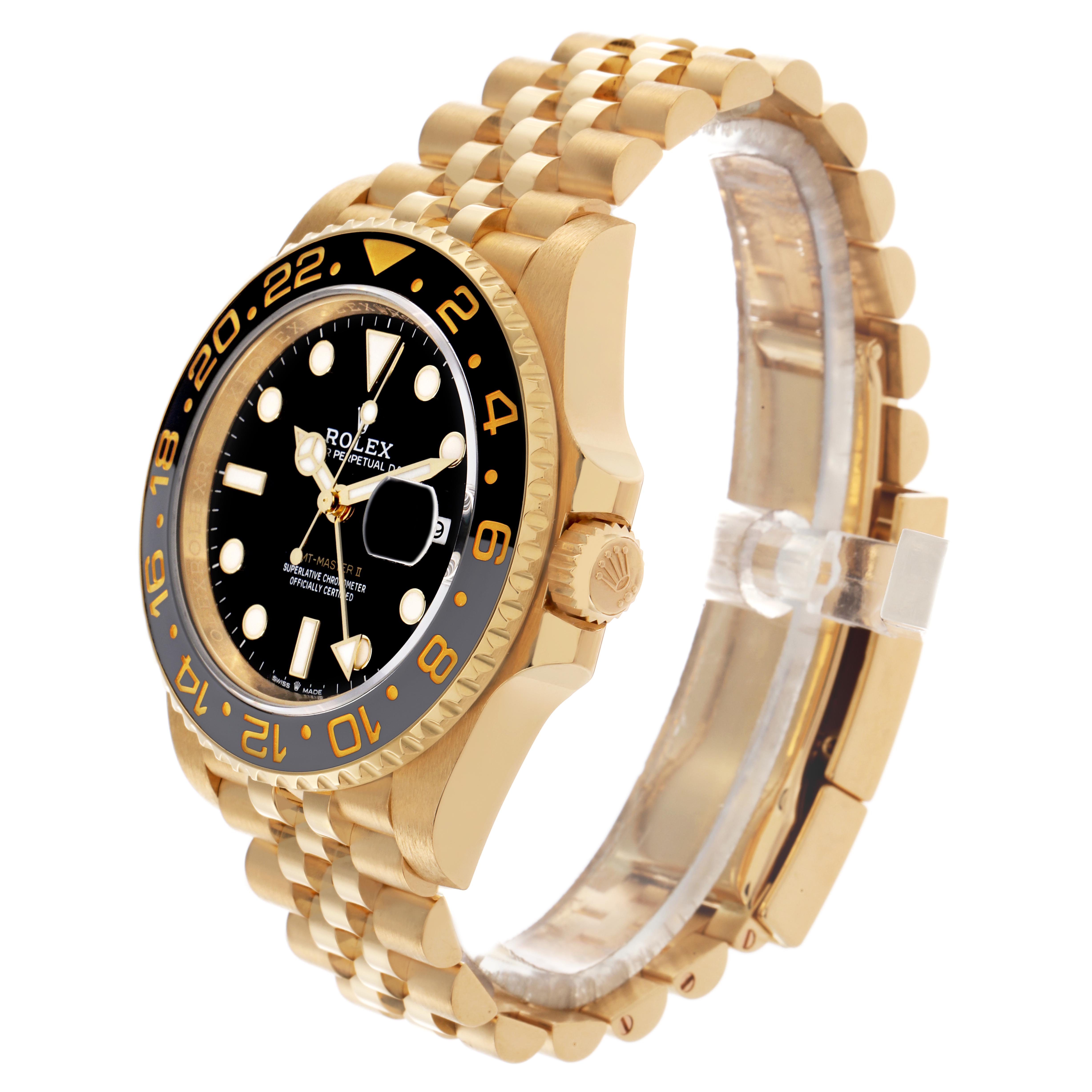 The Rolex GMT-Master 126718GRNR Men
s Yellow Gold Black Dial 126718GRNR Men
s Yellow Gold Black Dial watch is shown at an angle highlighting the face, bezel, crown, and bracelet.