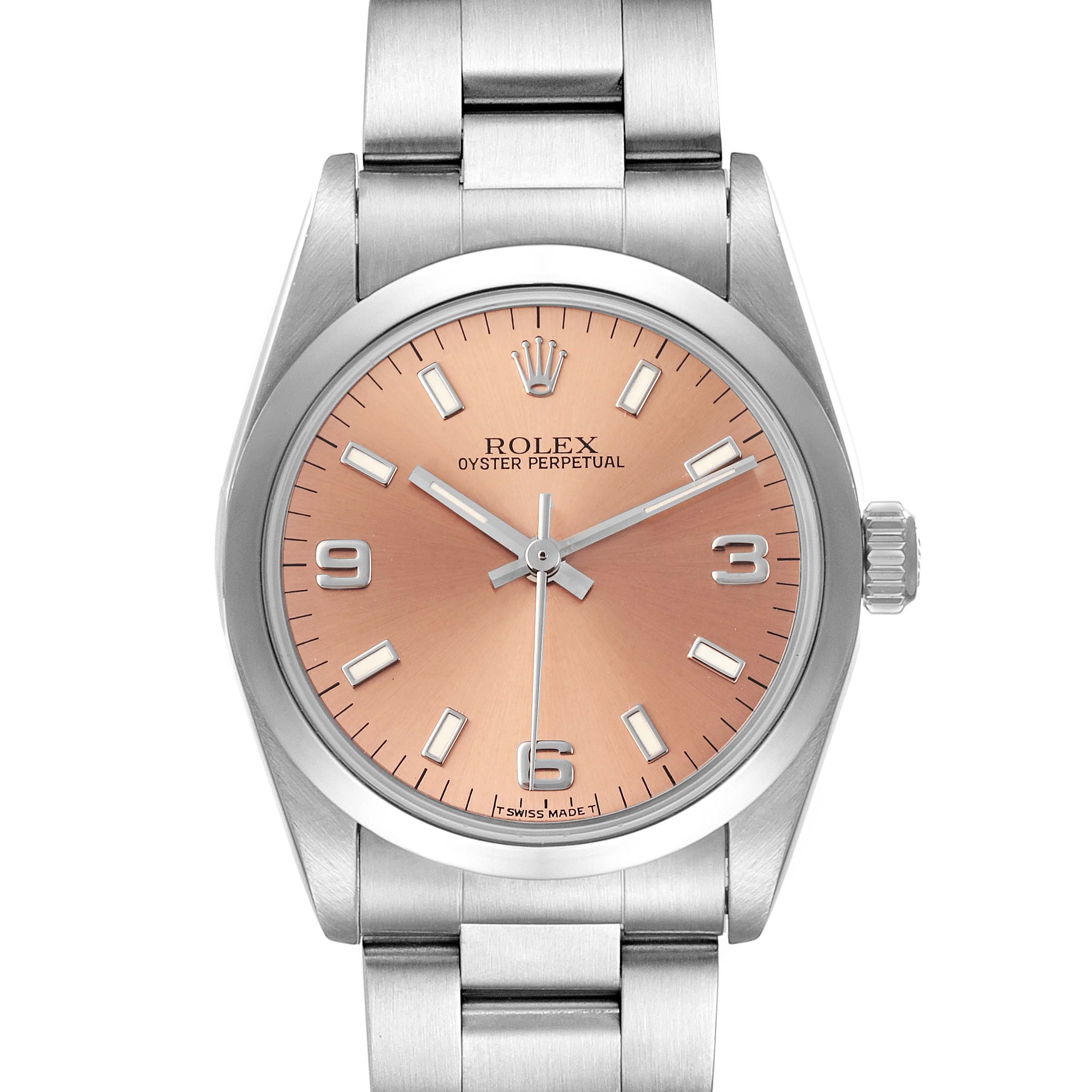 The image shows a front view of the Rolex Mid-Size 67480 Women's Stainless Steel Pink Dial 67480 Women's Stainless Steel Pink Dial Oyster Perpetual with a stainless steel bracelet and a salmon-colored dial.