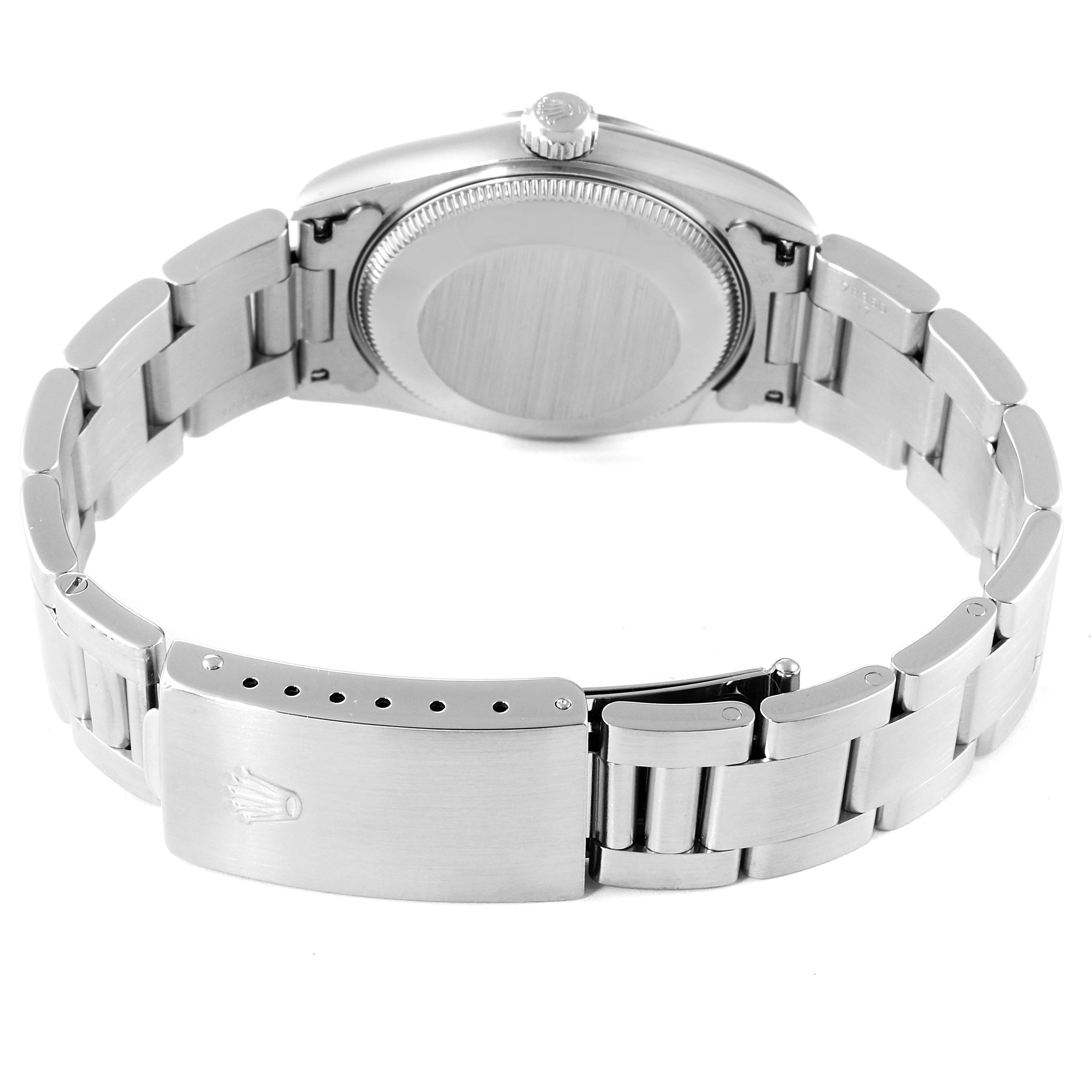 The image shows the back of a Rolex Mid-Size 67480 Women's Stainless Steel Pink Dial 67480 Women's Stainless Steel Pink Dial watch, highlighting the clasp, bracelet, and case back.