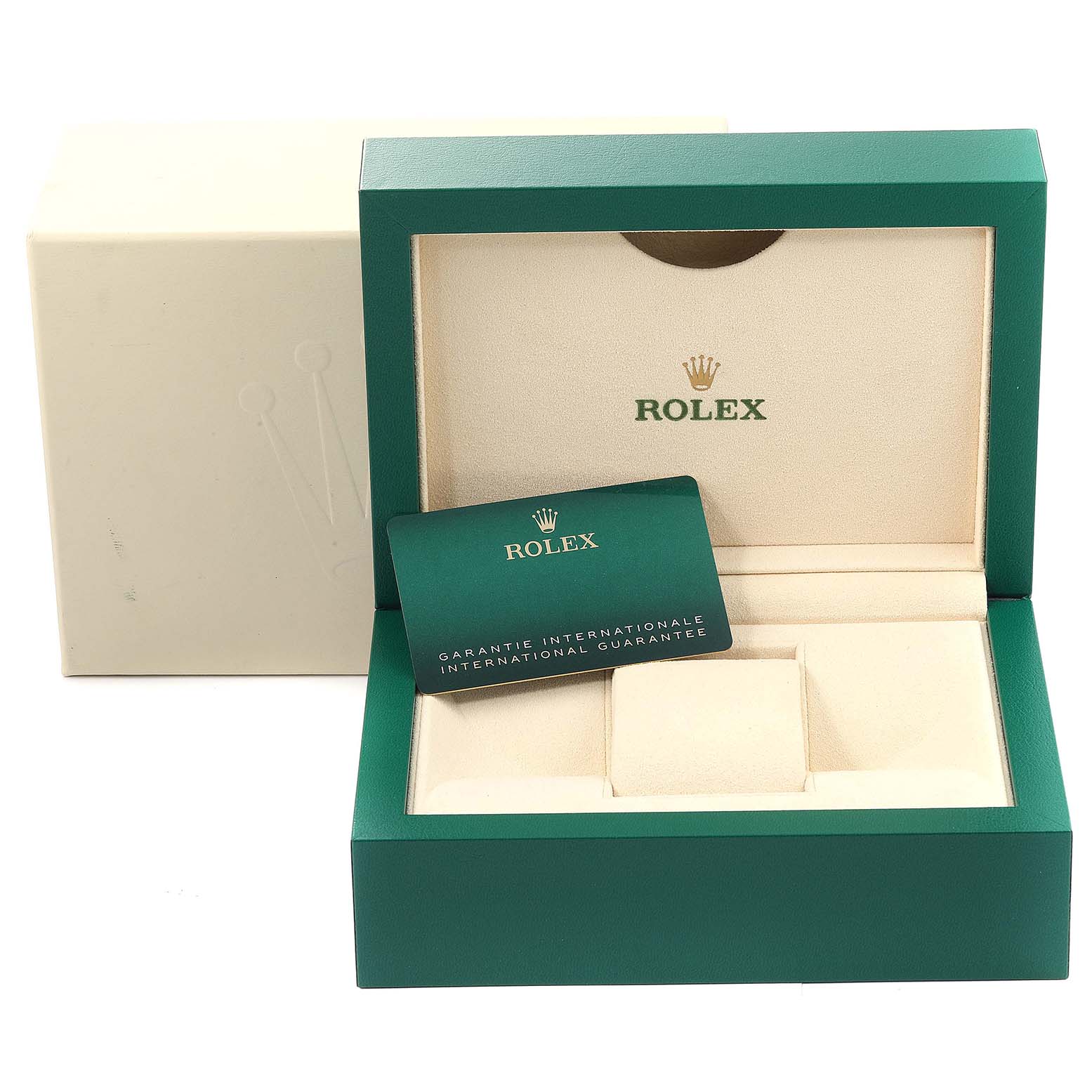 This image shows an open green box for a Rolex Oyster Perpetual 124200 Men
s Stainless Steel Black Dial 124200 Men
s Stainless Steel Black Dial, including the international guarantee card.