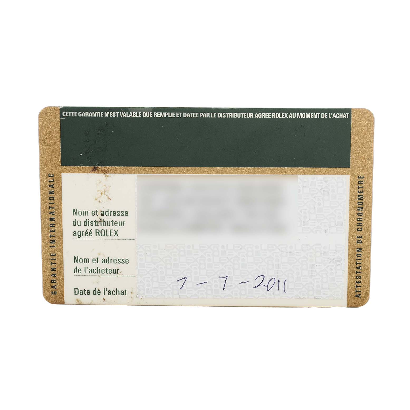 The image shows a Rolex Oyster Perpetual 116000 Men's Stainless Steel Silver Dial warranty card with purchase details and dealer information.