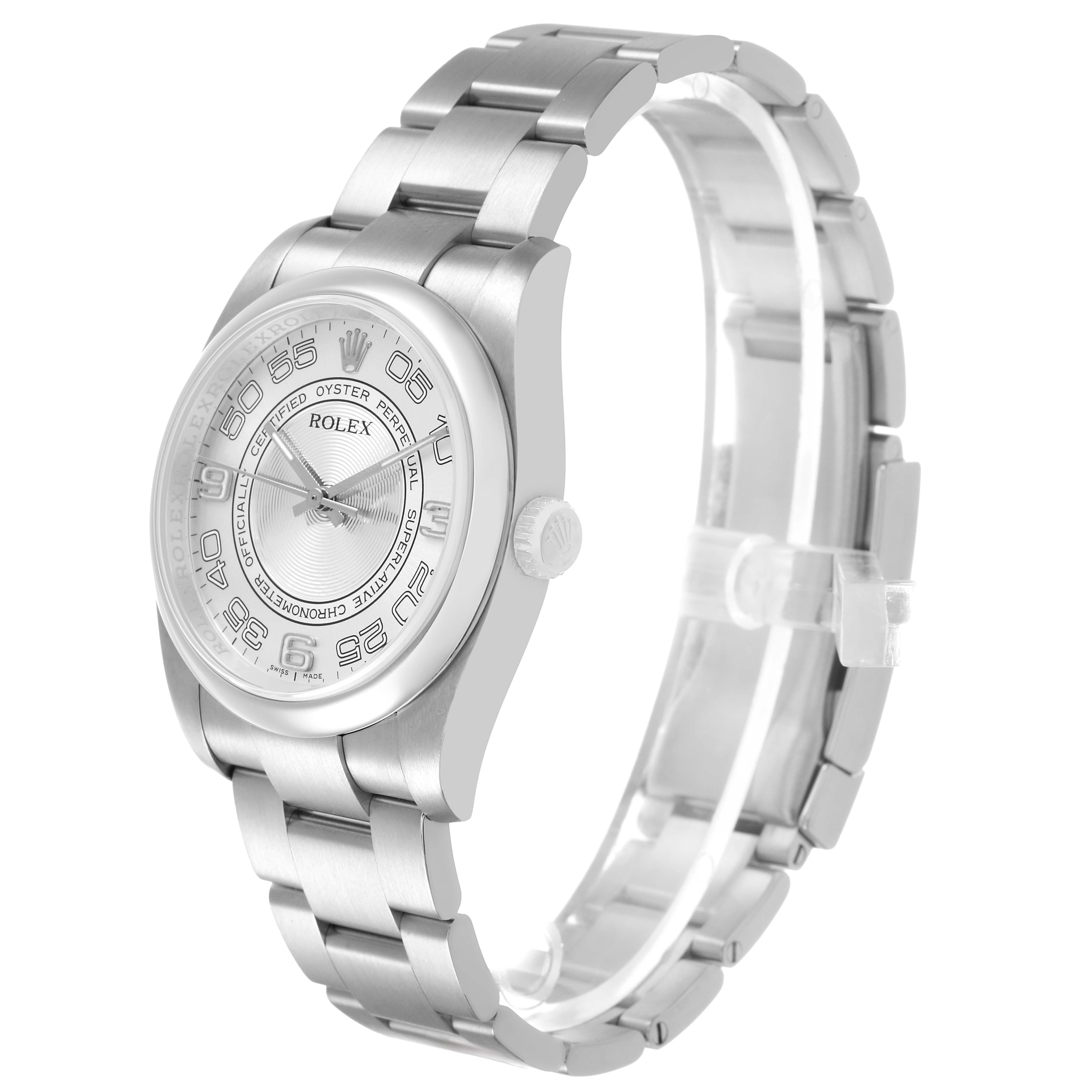 The Rolex Oyster Perpetual 116000 Men's Stainless Steel Silver Dial watch is shown at a three-quarter angle, highlighting the dial, bezel, case, and bracelet.