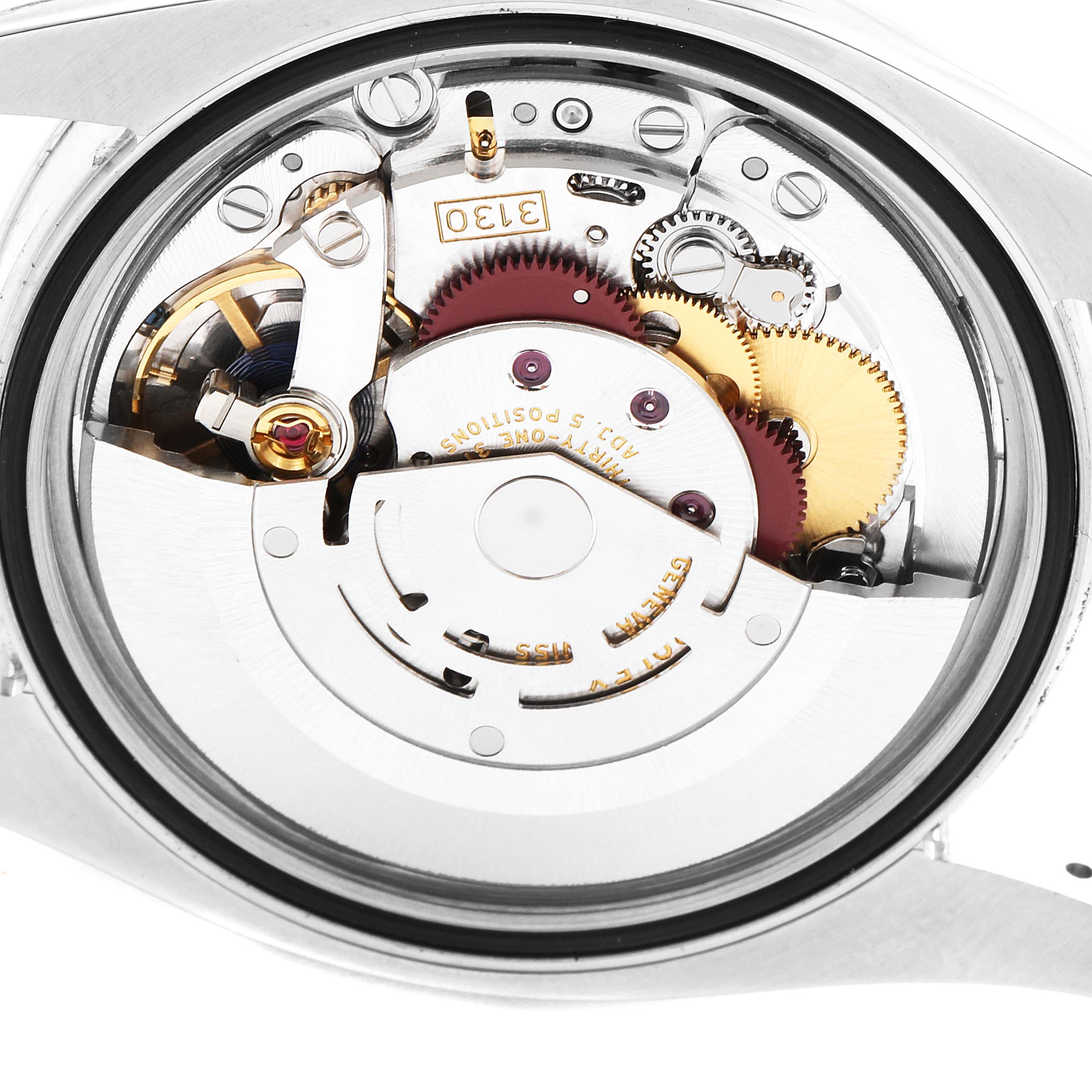 This image shows the movement mechanism inside a Rolex Oyster Perpetual 116000 Men's Stainless Steel Silver Dial 116000 Men's Stainless Steel Silver Dial watch, viewed from the back.