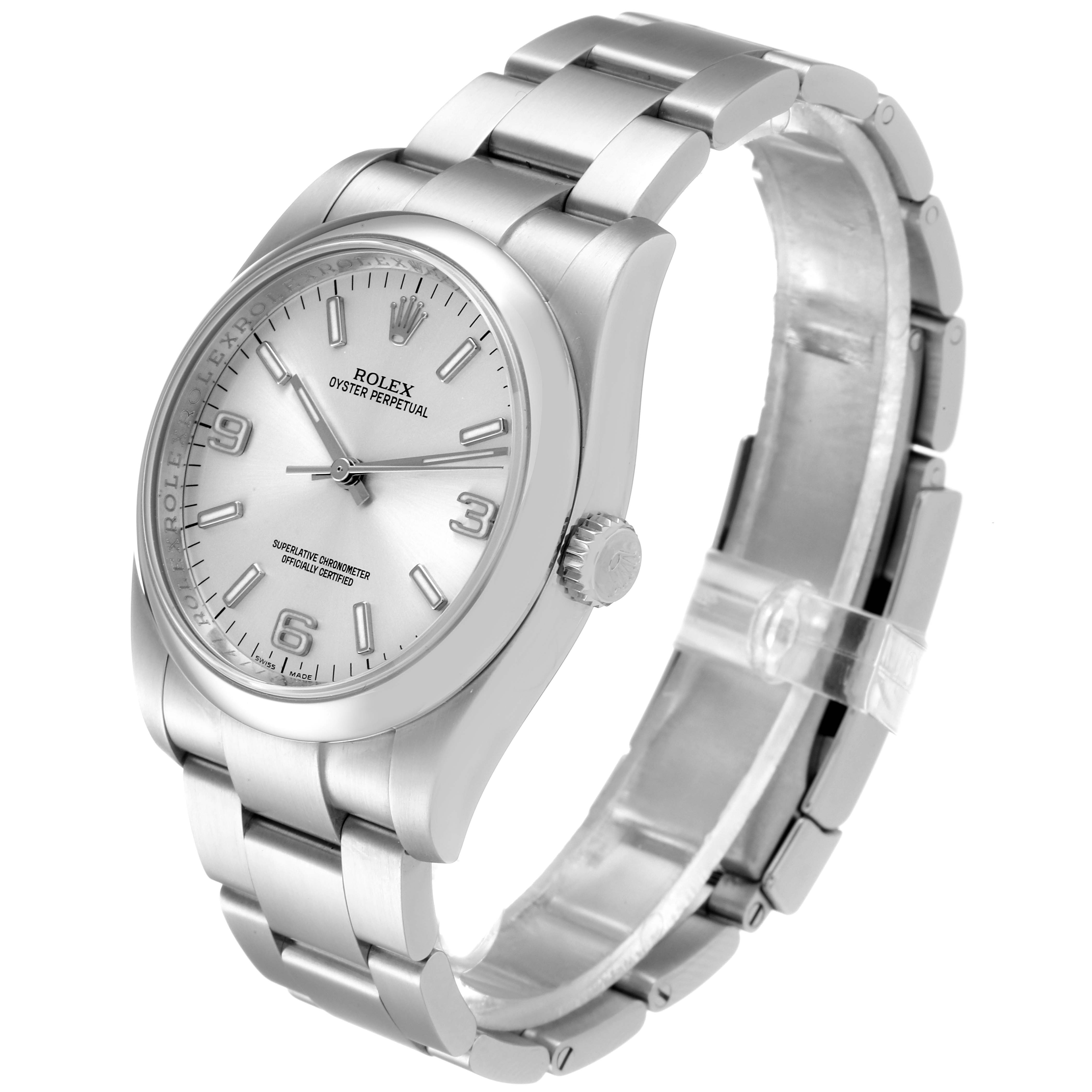 The image shows a side angle view of a Rolex Oyster Perpetual 116000 Men's Stainless Steel Silver Dial 116000 Men's Stainless Steel Silver Dial watch, displaying its dial, case, and bracelet.