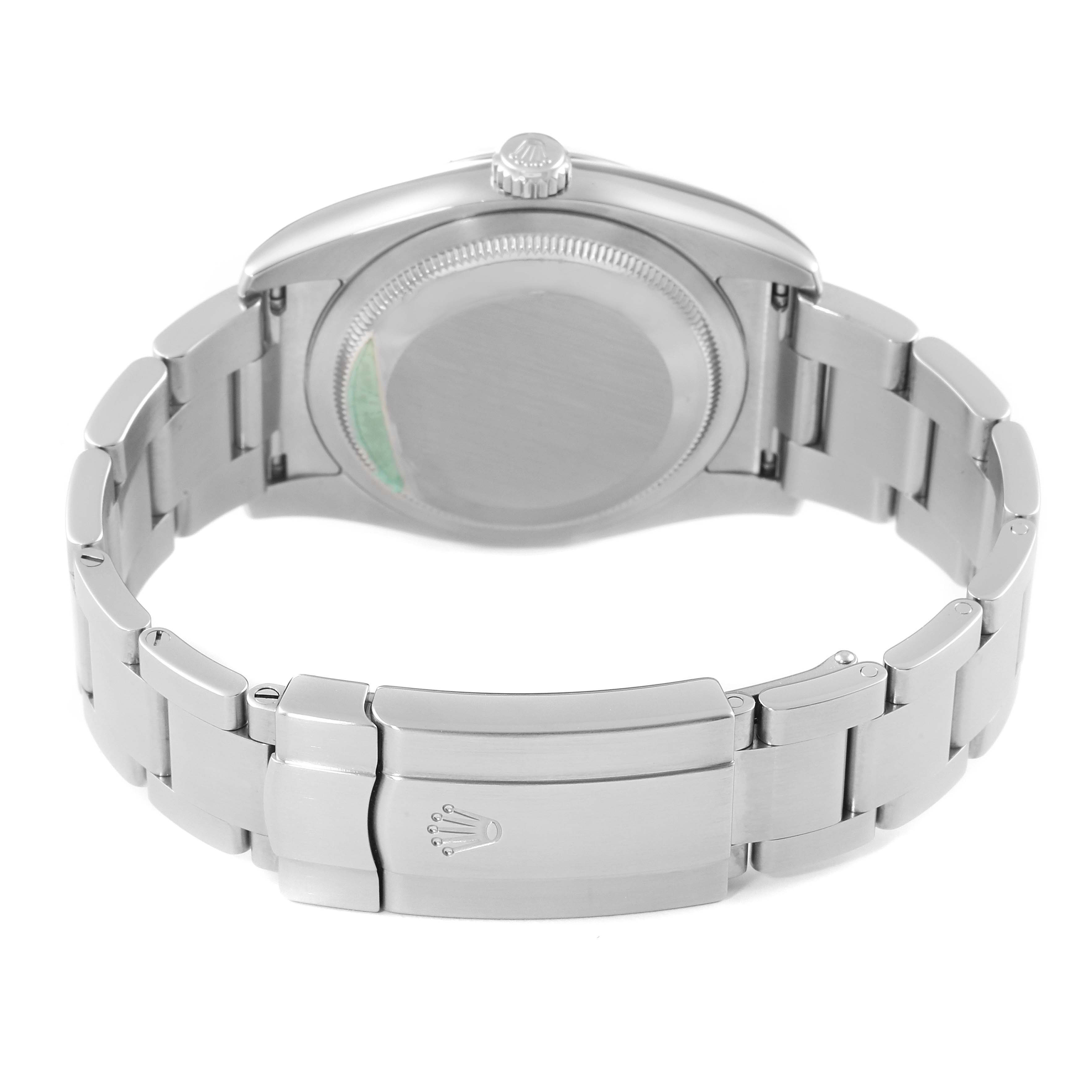 The Rolex Oyster Perpetual 116000 Men's Stainless Steel Silver Dial 116000 Men's Stainless Steel Silver Dial watch is shown from the backside, highlighting the bracelet and the caseback.