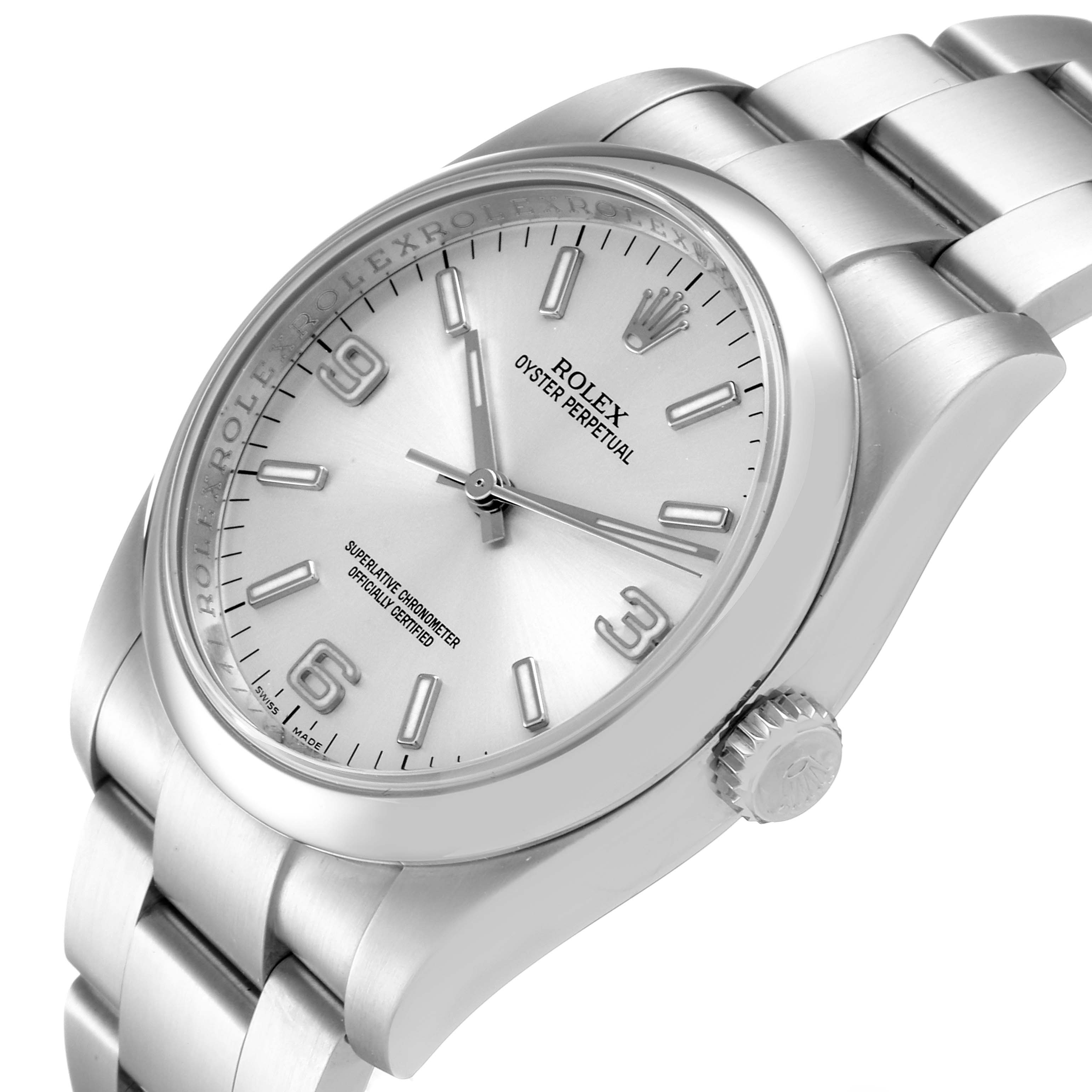 The Rolex Oyster Perpetual 116000 Men's Stainless Steel Silver Dial 116000 Men's Stainless Steel Silver Dial watch shown is angled to display the face, case, crown, and part of the bracelet.