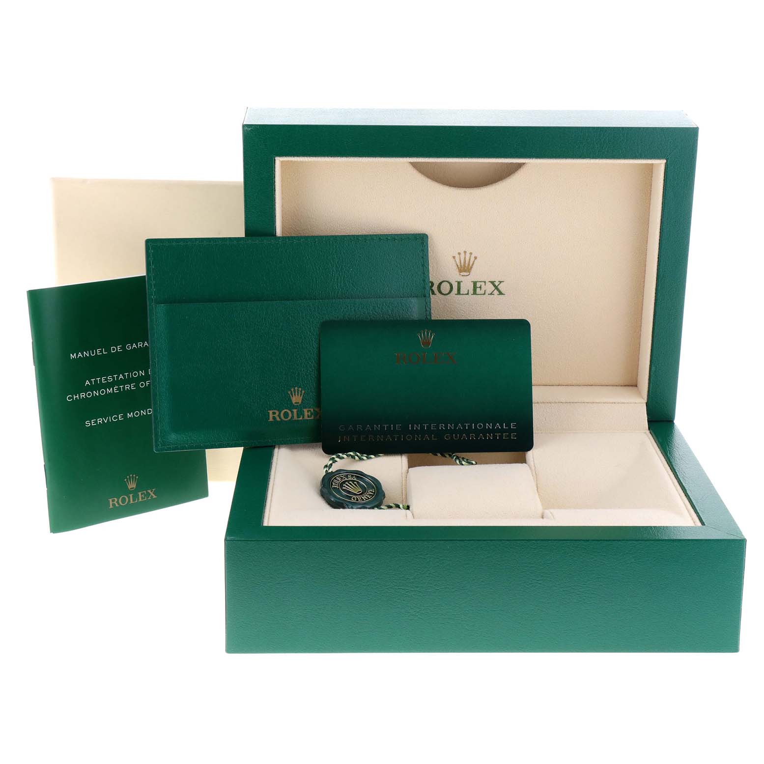 The image shows the accessories of a Rolex Oyster Perpetual 114300 Men
s Stainless Steel Blue Dial 114300 Men
s Stainless Steel Blue Dial watch, including packaging, manuals, a warranty card, and a tag.