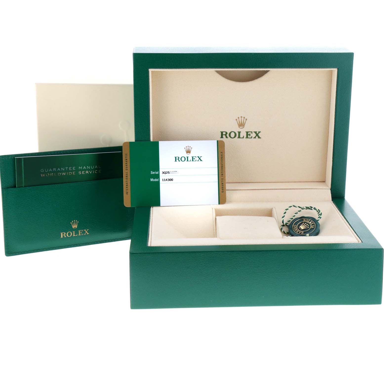 The image shows the packaging, warranty card, and manual for a Rolex Oyster Perpetual 114300 Men's Stainless Steel Burgundy Dial 114300 Men's Stainless Steel Burgundy Dial watch model 114300.