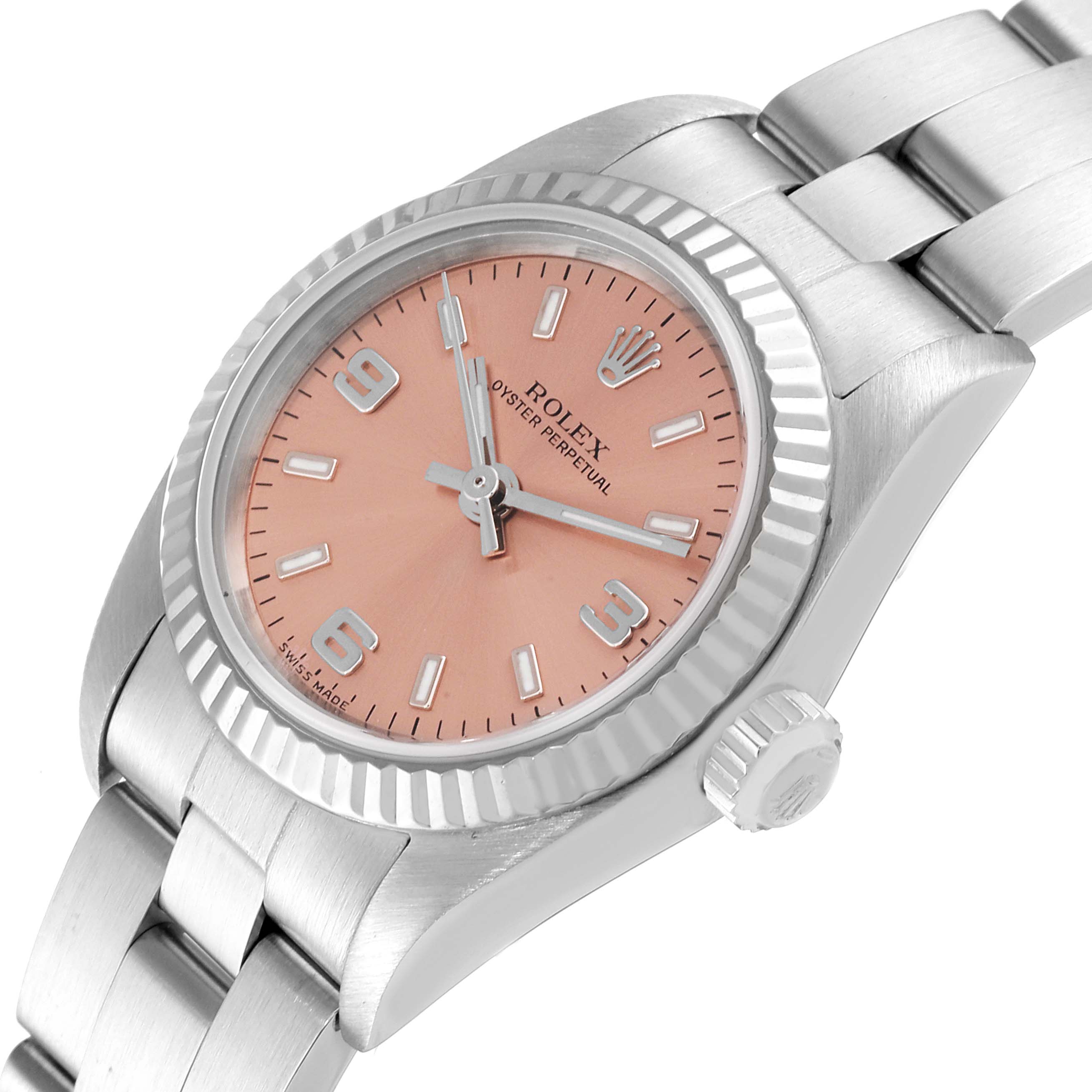 This is a close-up angled view of a Rolex Oyster Perpetual 76094 Women
s Stainless Steel Pink Dial 76094 Women
s Stainless Steel Pink Dial watch, showing the dial, case, crown, and part of the bracelet.