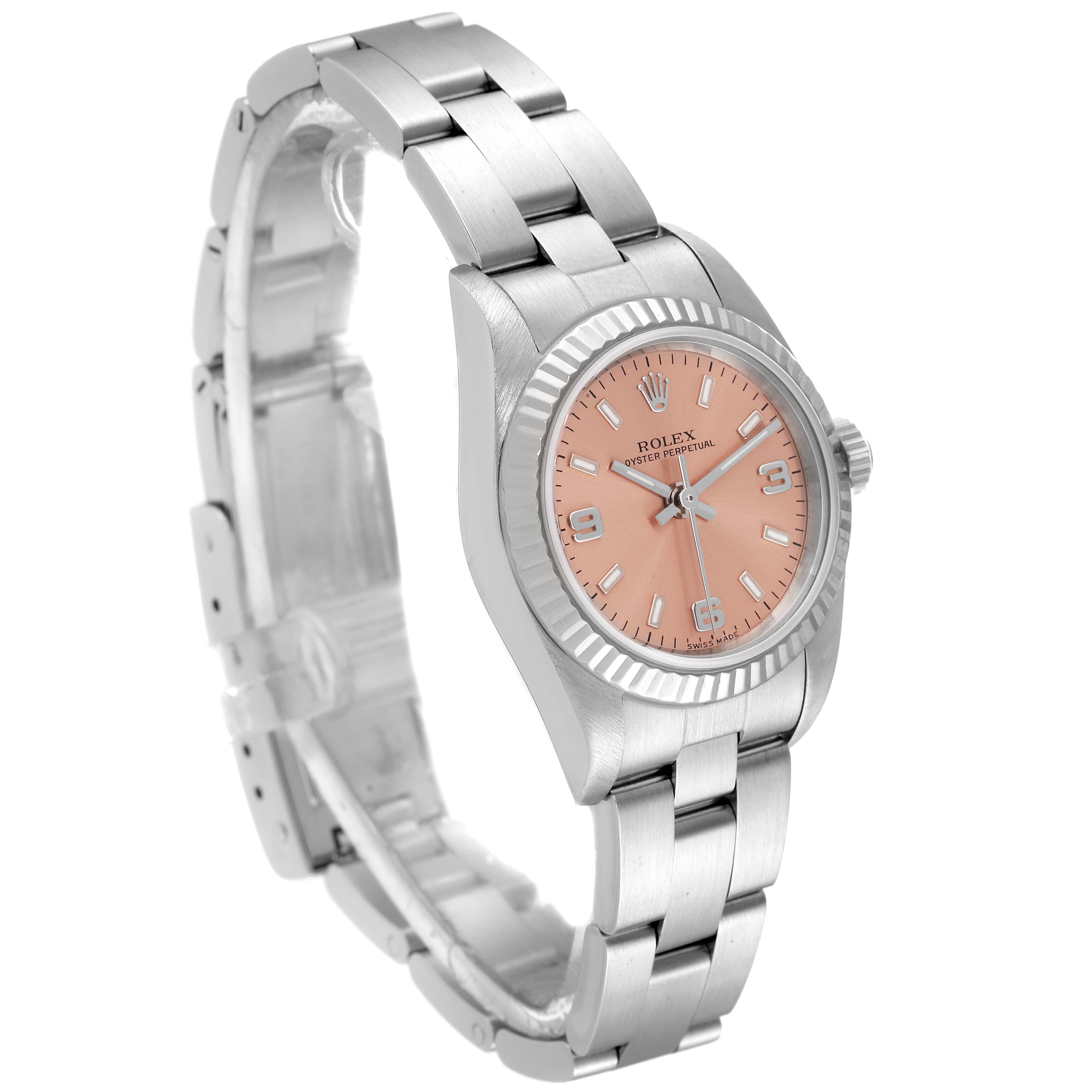 The Rolex Oyster Perpetual 76094 Women
s Stainless Steel Pink Dial 76094 Women
s Stainless Steel Pink Dial watch is shown at a three-quarter angle, highlighting the watch face, band, and clasp.
