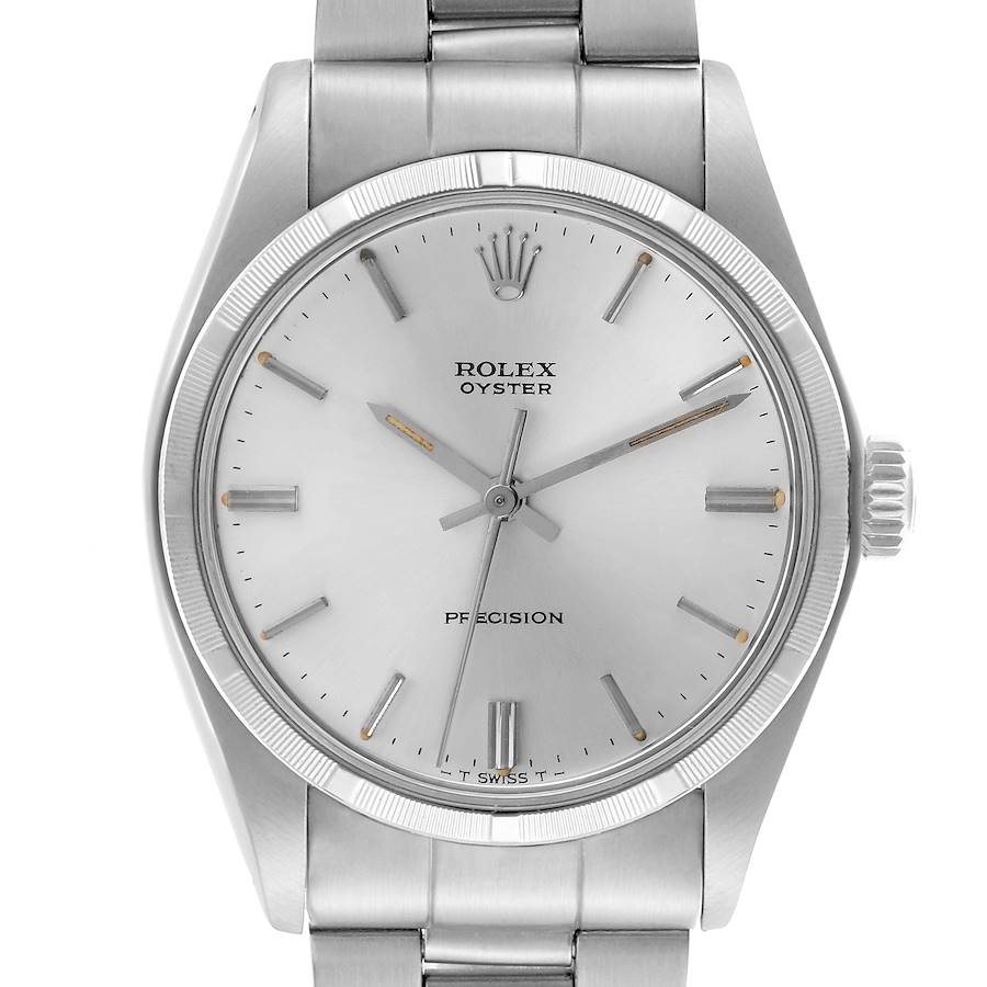 The image shows the face, bezel, and part of the bracelet of a Rolex Vintage Collection watch from a front view.