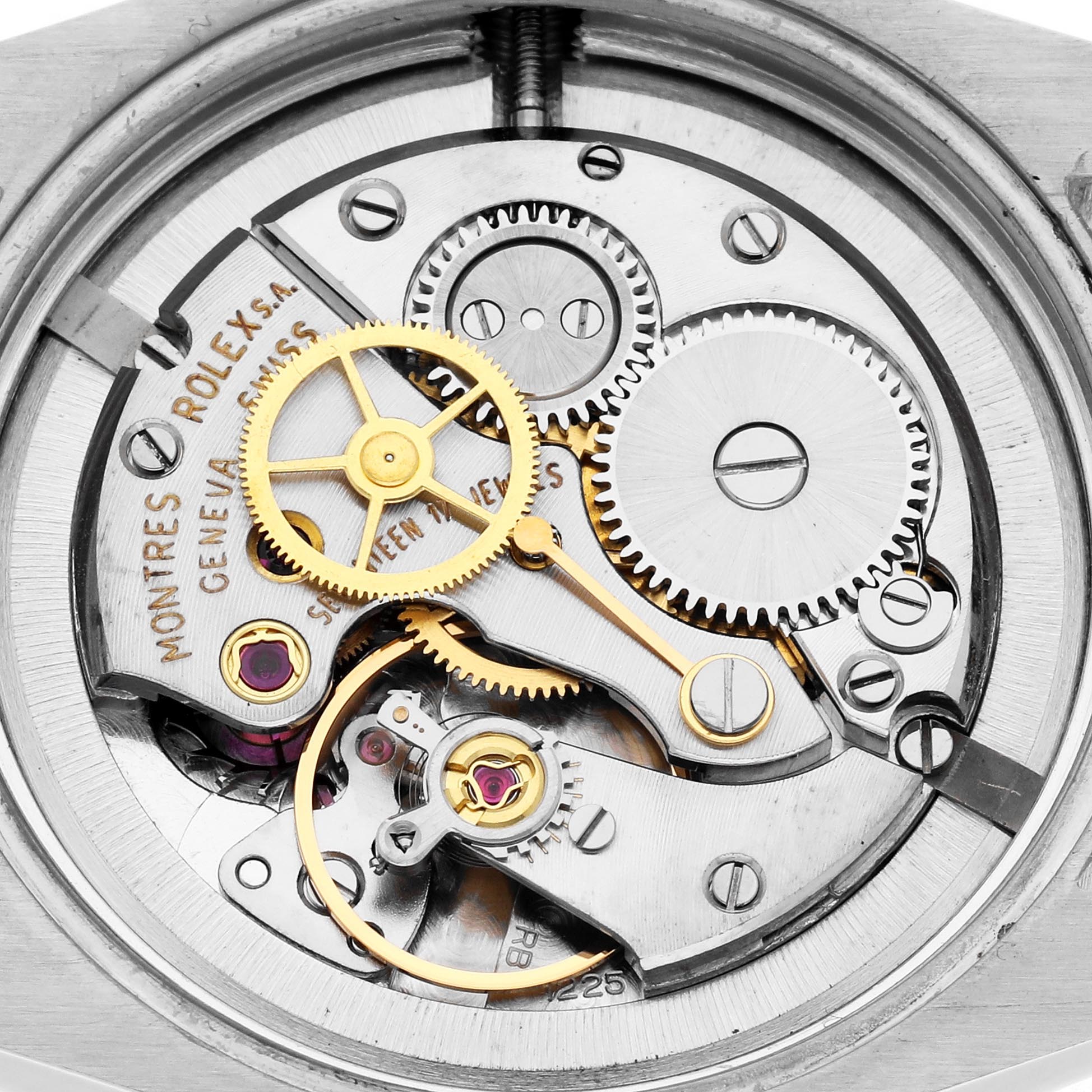 The image shows the internal mechanism of a Rolex Vintage Collection 6427 Men
s Stainless Steel Silver Dial 6427 Men
s Stainless Steel Silver Dial model, highlighting gears and components at a top-down angle.