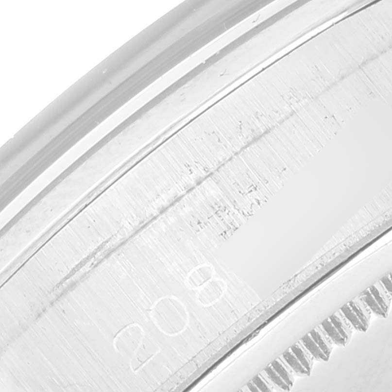 This is a close-up view of the serial number engraving on the case of the Rolex Date 6694 Men's Stainless Steel Black Dial 6694 Men's Stainless Steel Black Dial model watch.