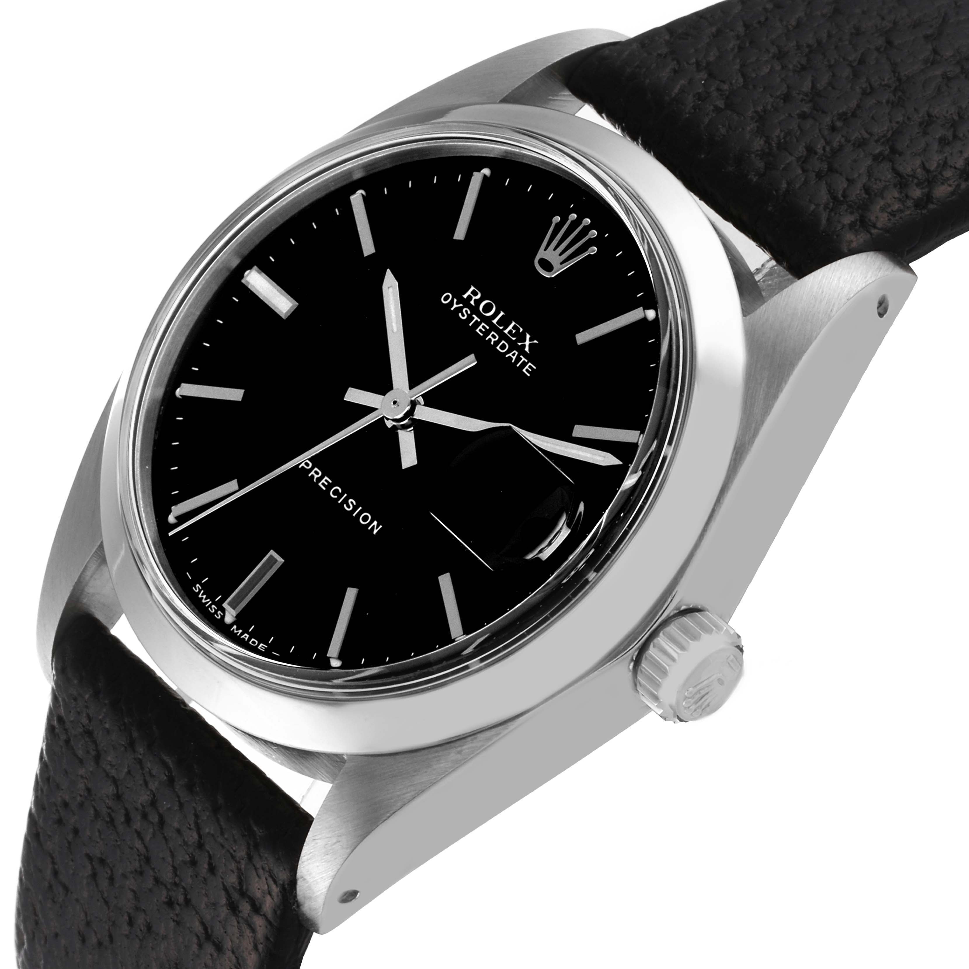 The Rolex Oysterdate Precision watch is shown at an angled view, highlighting the crown, dial, and part of the strap.