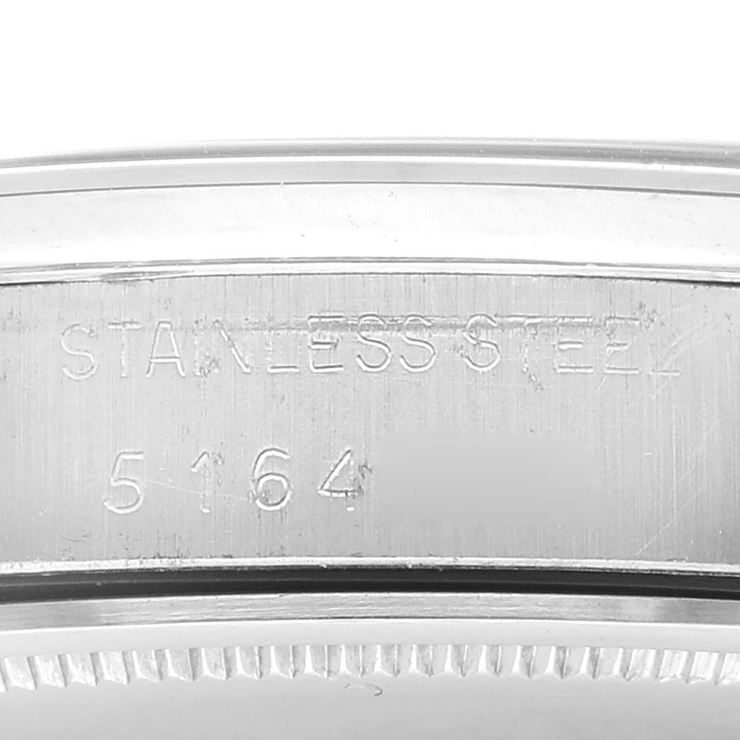 The image shows the stainless steel case back and model number of a Rolex Vintage Collection 6694 Men's Stainless Steel Silver Dial 6694 Men's Stainless Steel Silver Dial watch.