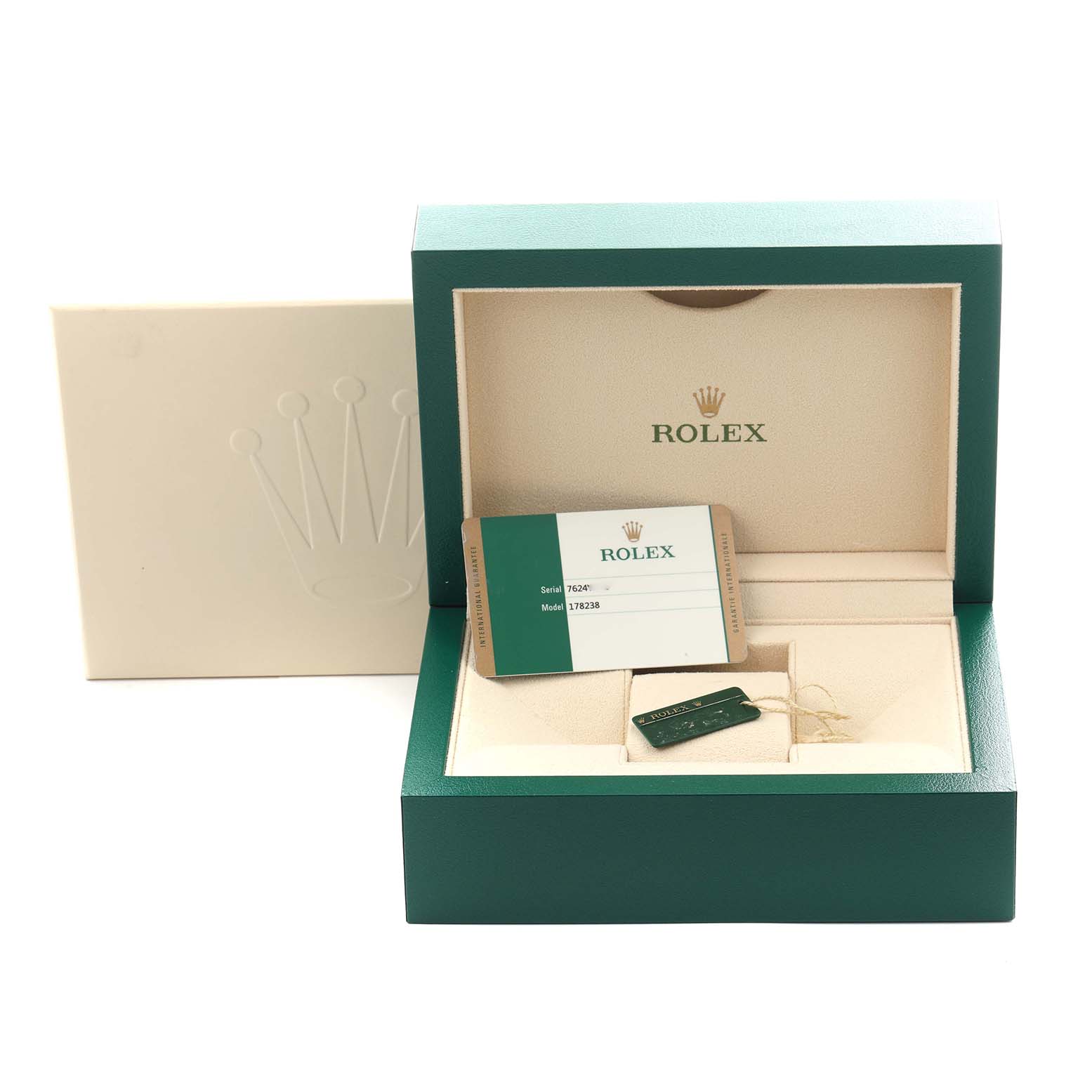 The image shows an open Rolex President 178238G Women
s Yellow Gold Champagne Dial 178238G Women
s Yellow Gold Champagne Dial model box with a warranty card and tag inside.