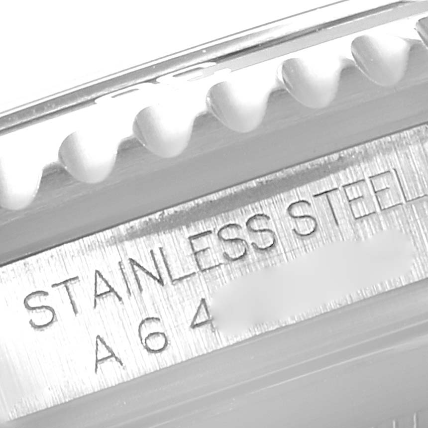 This close-up image shows the engravings on the side of the bezel and case of a Rolex Submariner 16610 Men
s Stainless Steel Black Dial 16610 Men
s Stainless Steel Black Dial watch.