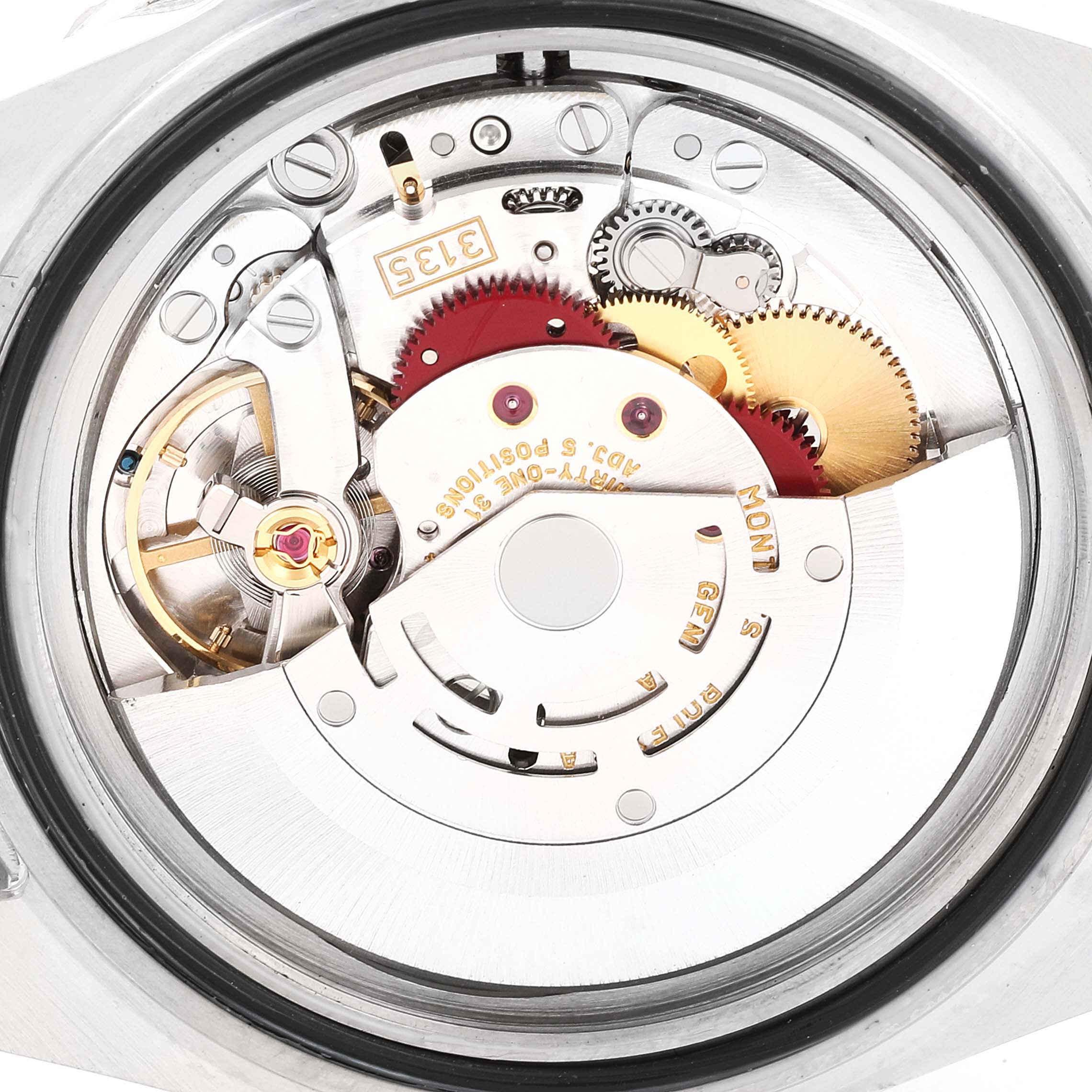 The image shows the intricate inner mechanism and parts of a Rolex Submariner 16610 Men
s Stainless Steel Black Dial 16610 Men
s Stainless Steel Black Dial watch, viewed from the back.