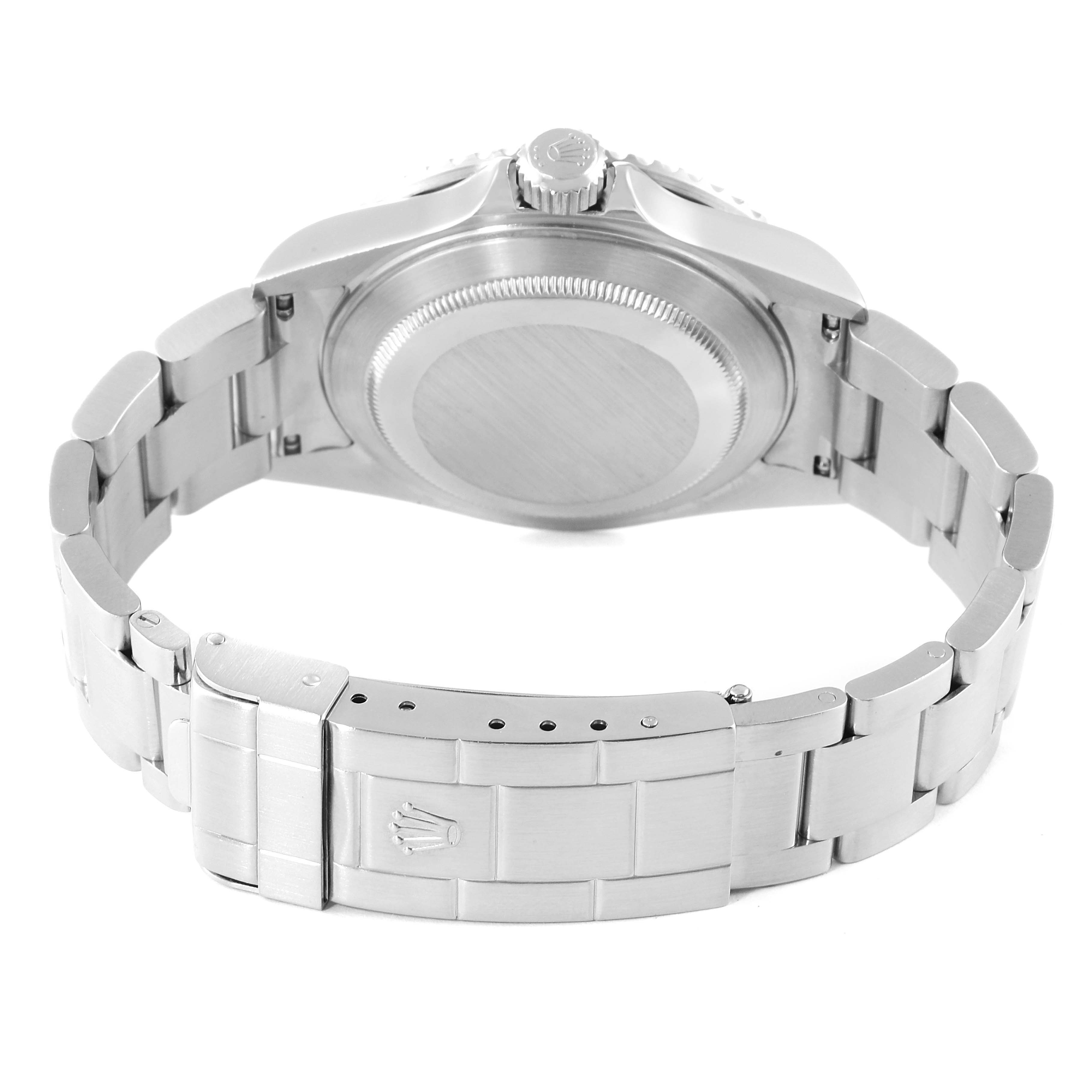 The image shows the back and bracelet of a Rolex Submariner 16610 Men
s Stainless Steel Black Dial 16610 Men
s Stainless Steel Black Dial watch from a rear angle.